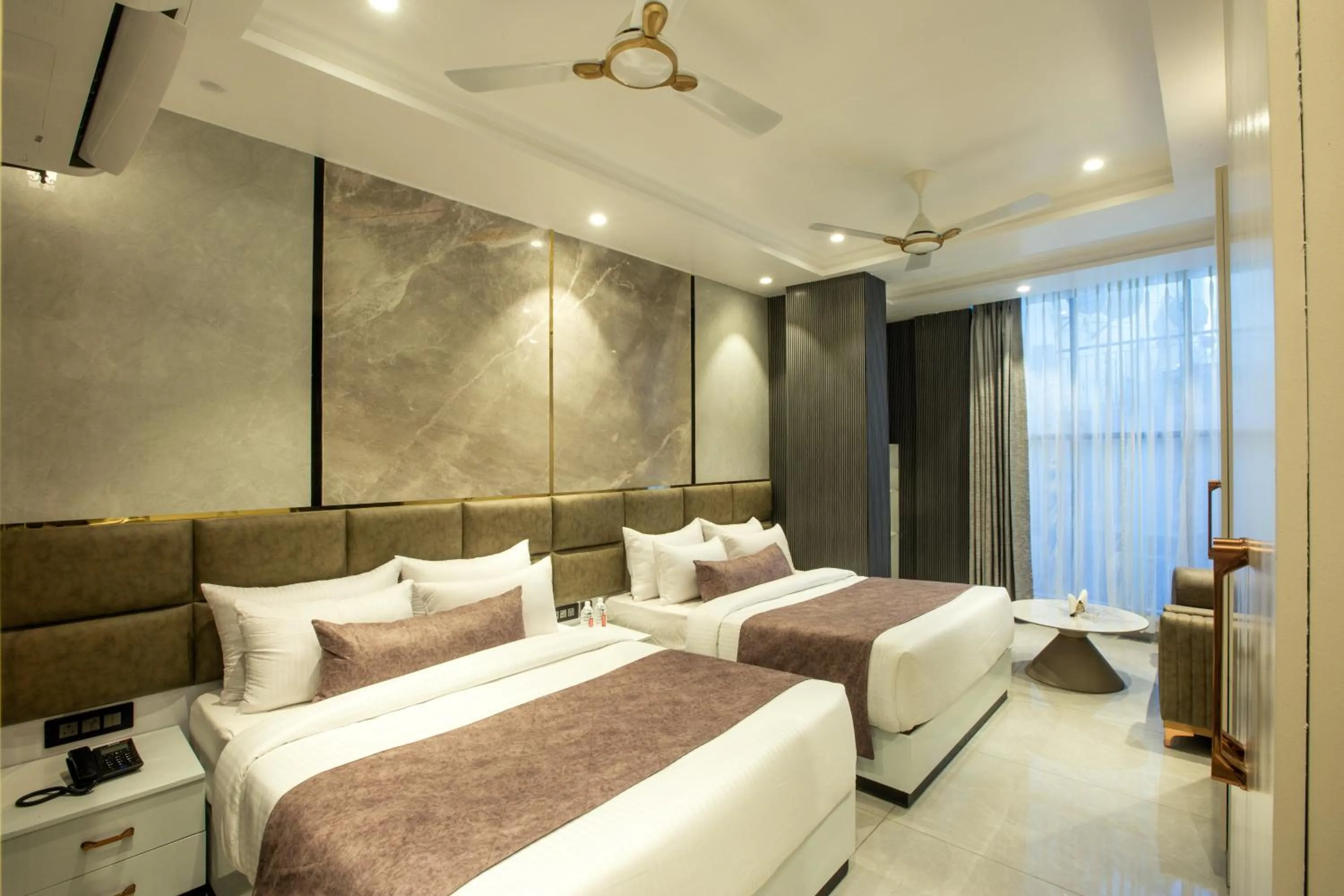 Photo of the whole room, Bed in Hotel Aroma Suites Delhi Airport