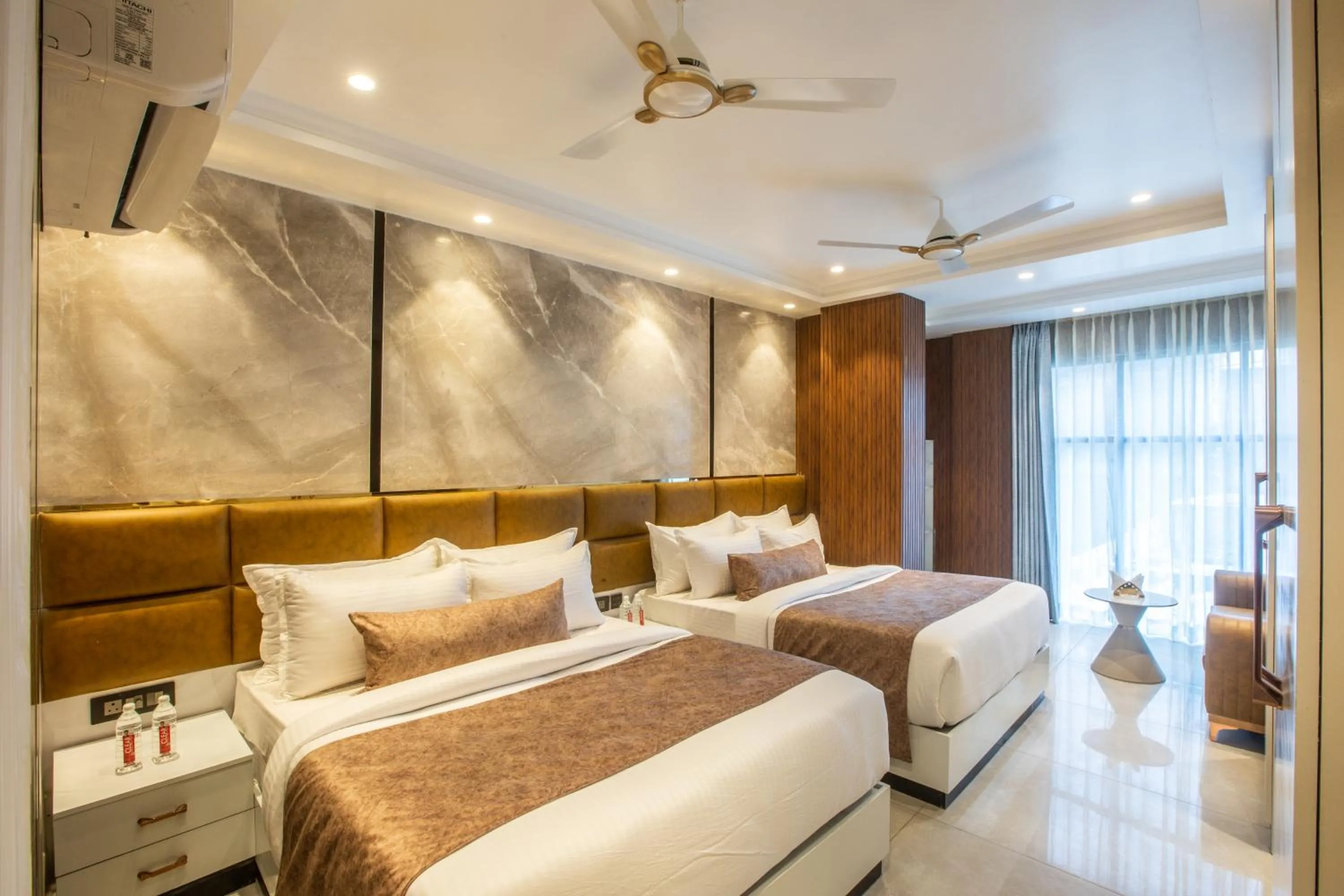 Photo of the whole room, Bed in Hotel Aroma Suites Delhi Airport