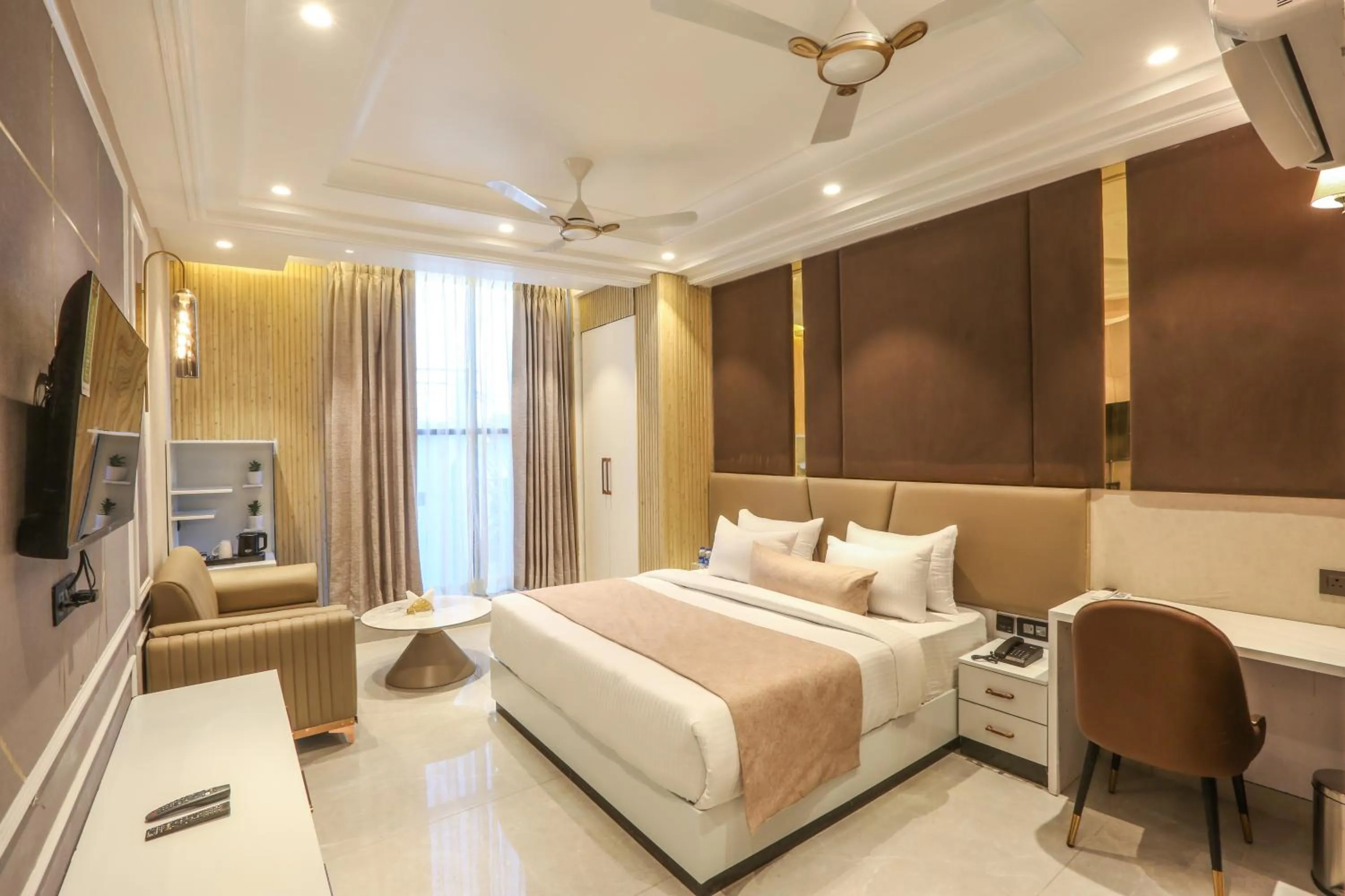 Photo of the whole room, Bed in Hotel Aroma Suites Delhi Airport