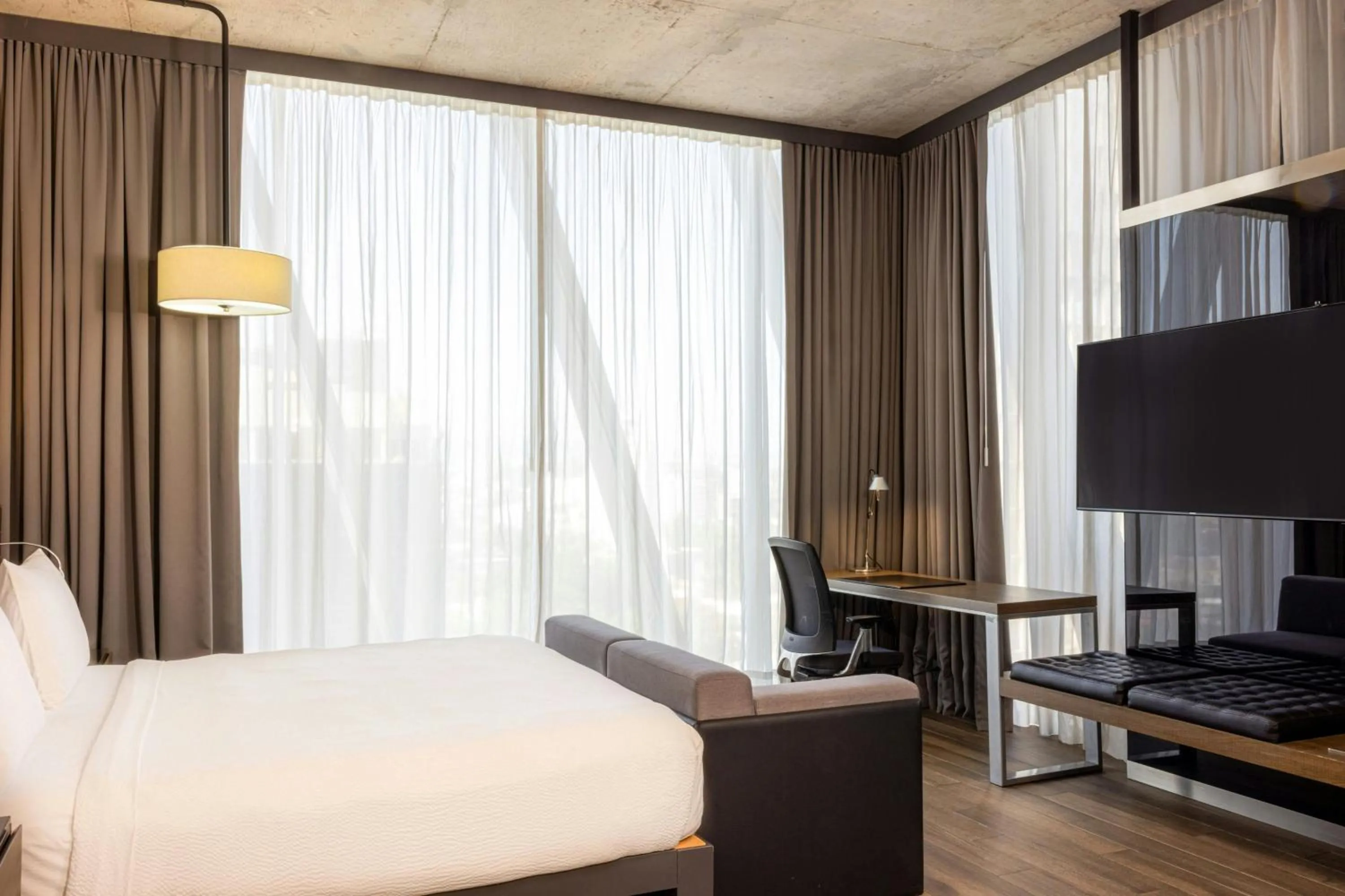 Photo of the whole room, Bed in AC Hotel by Marriott Guadalajara Mexico