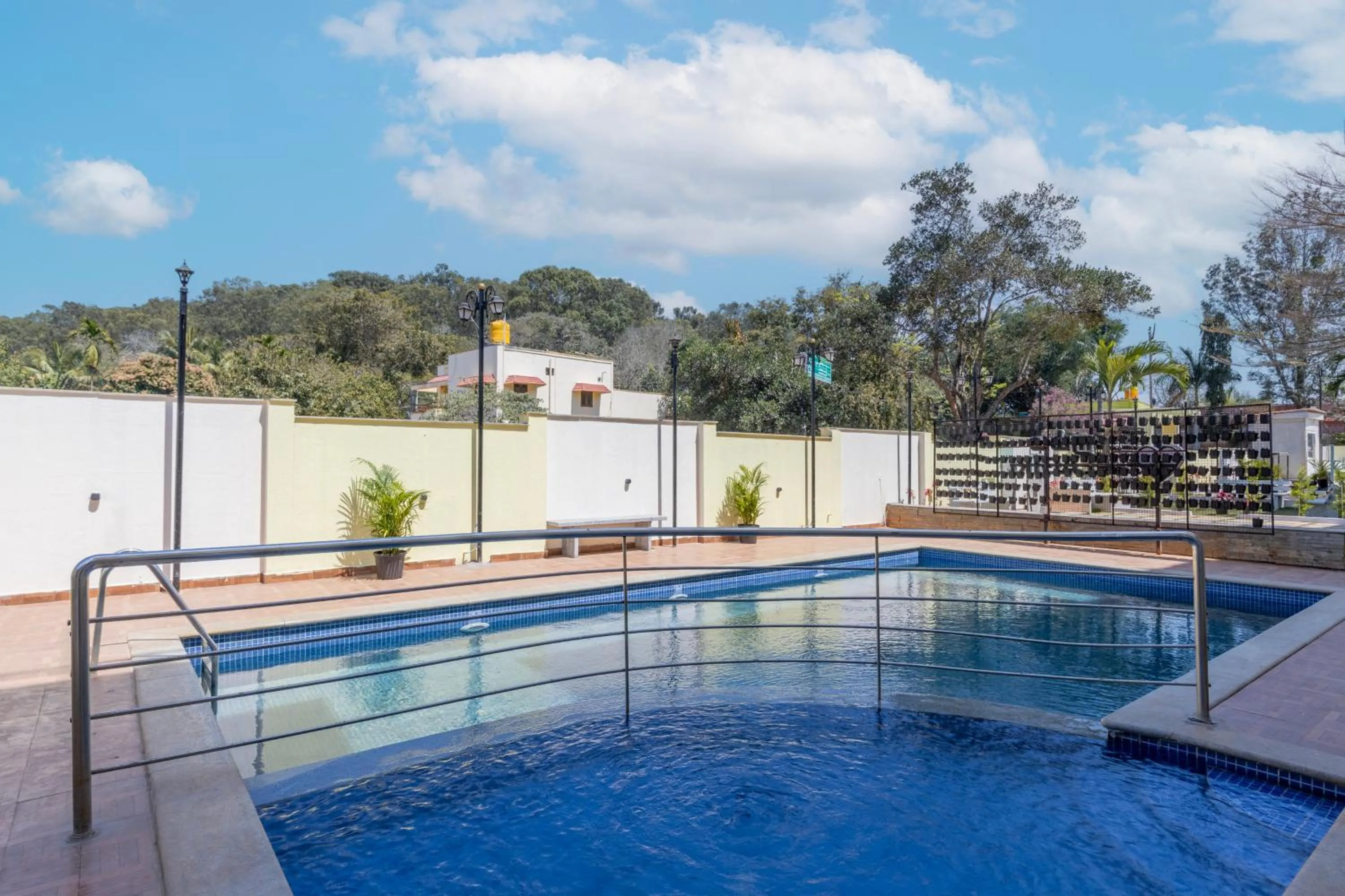 Swimming pool in Treebo Premium Emerald Dove