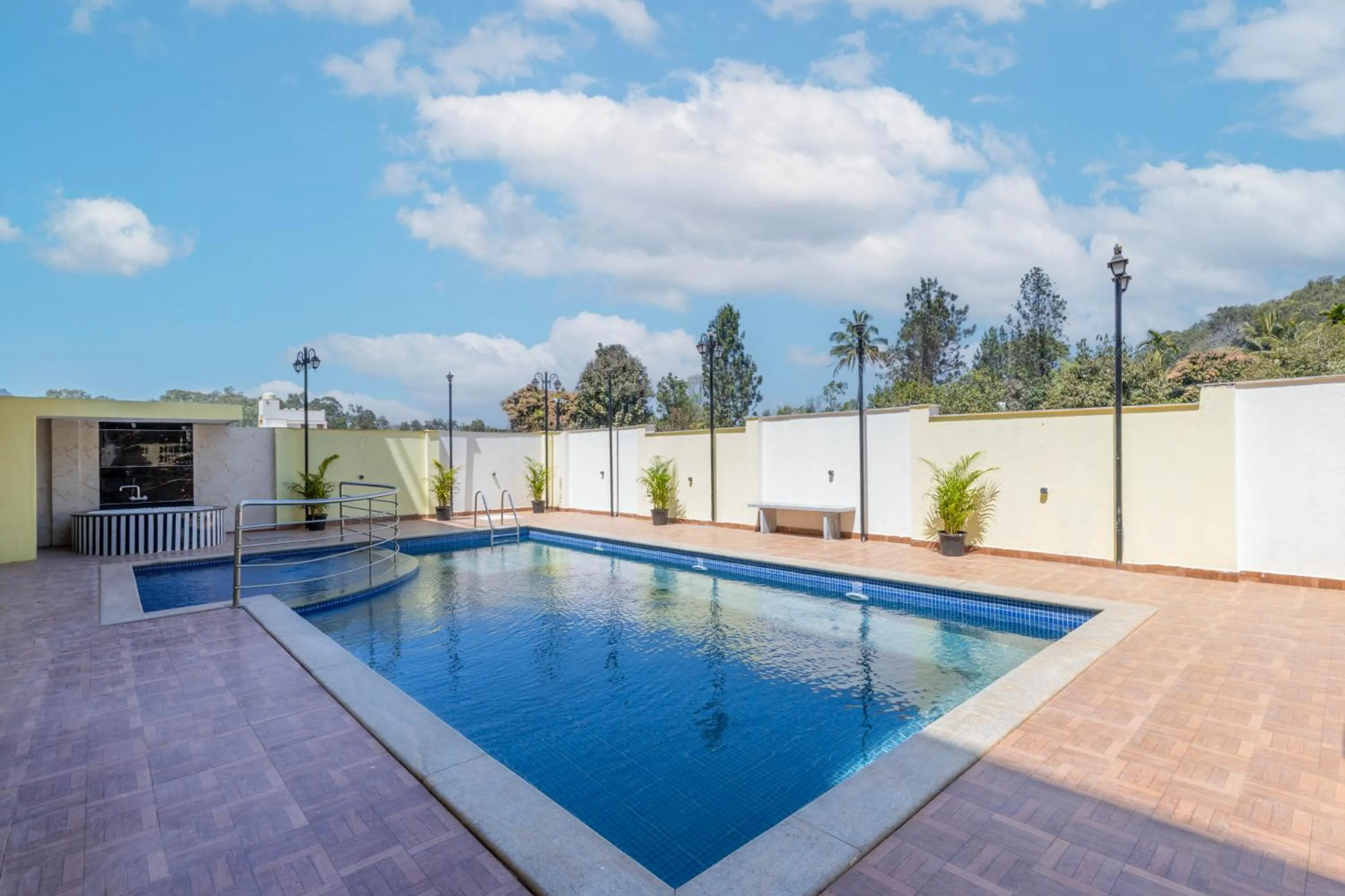 Swimming pool in Treebo Premium Emerald Dove