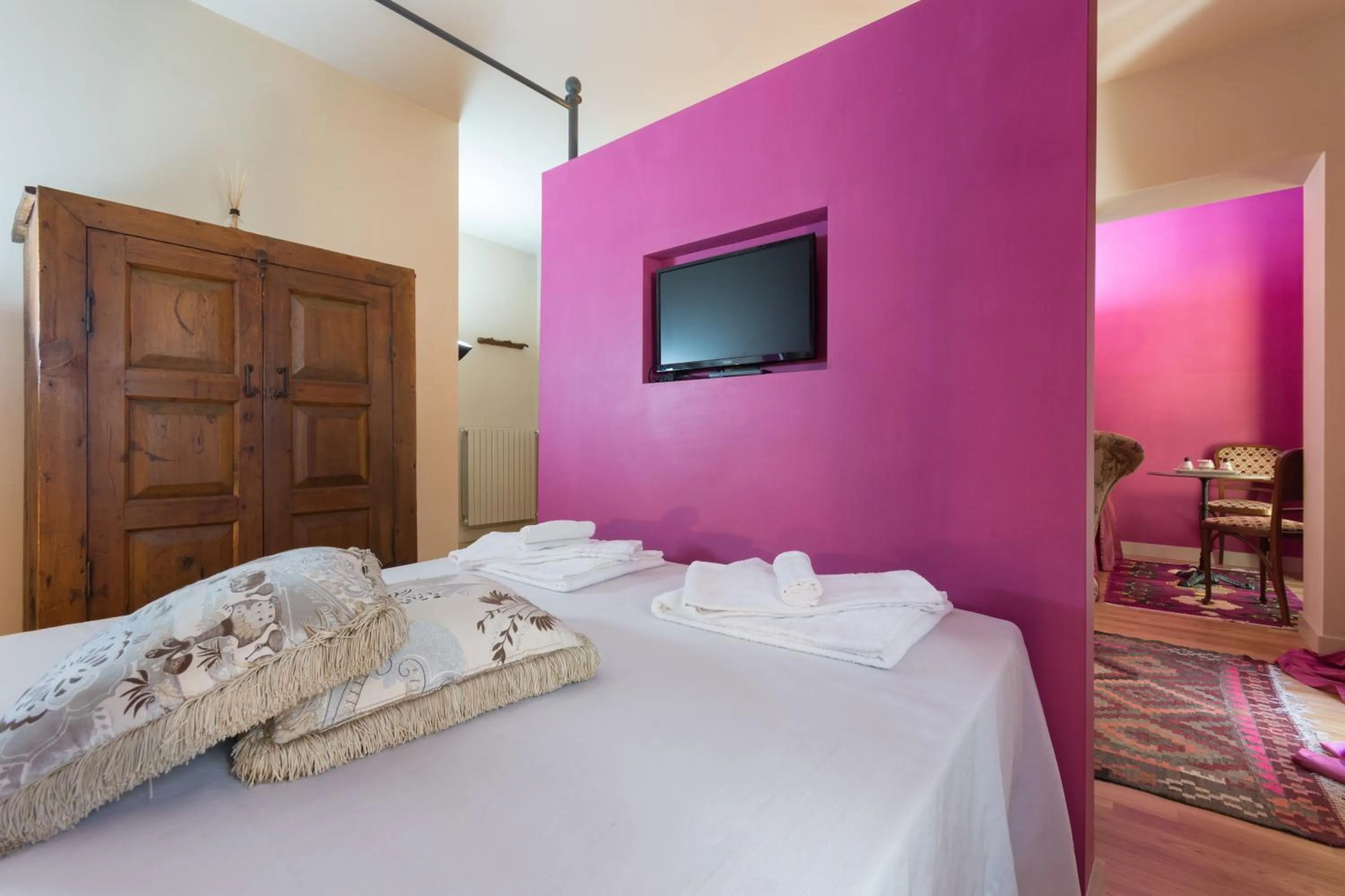 Bed in Porta Palace Apartments