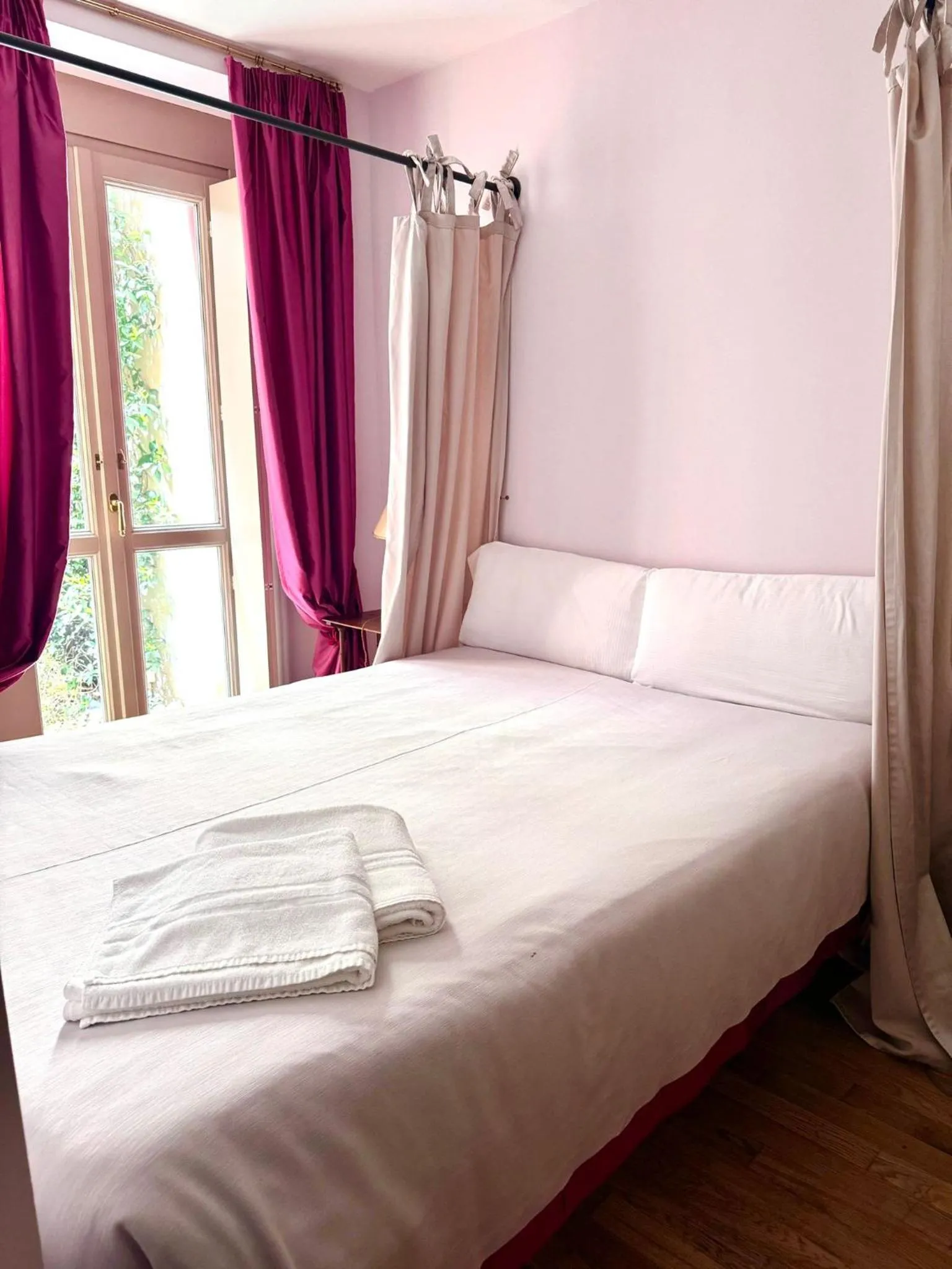 Bed in Porta Palace Apartments