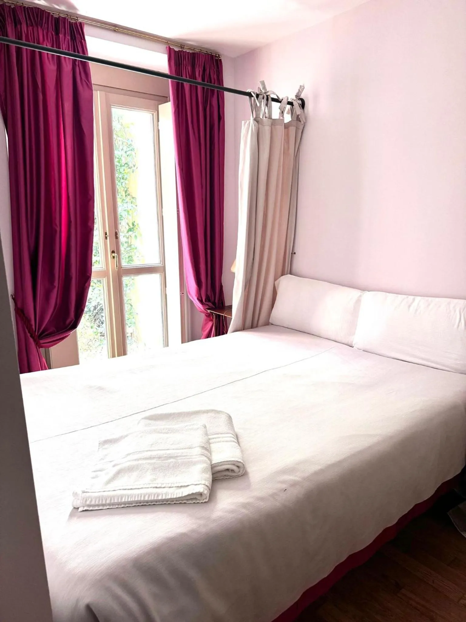 Bed in Porta Palace Apartments