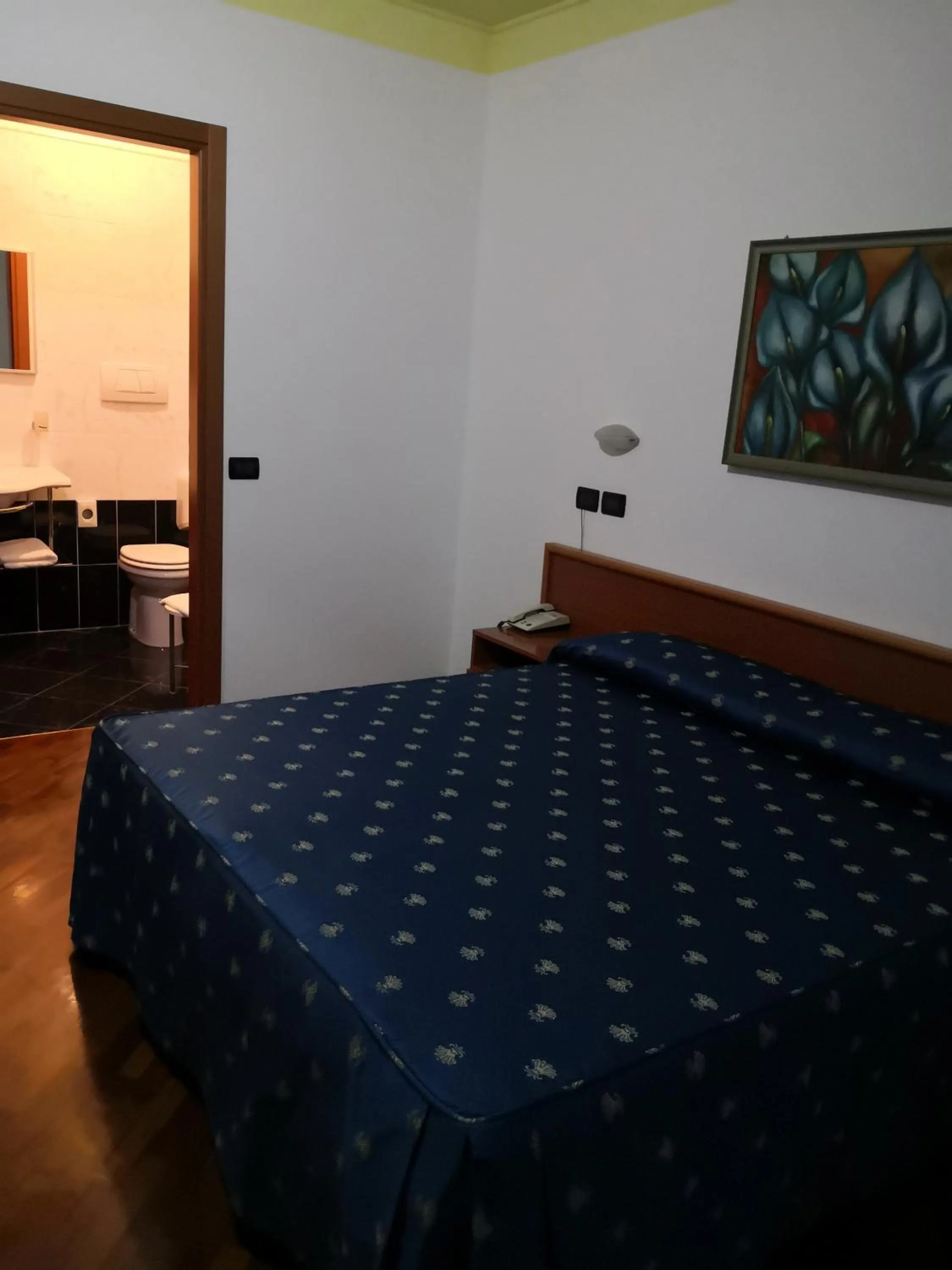 Bed in Hotel La Cantina