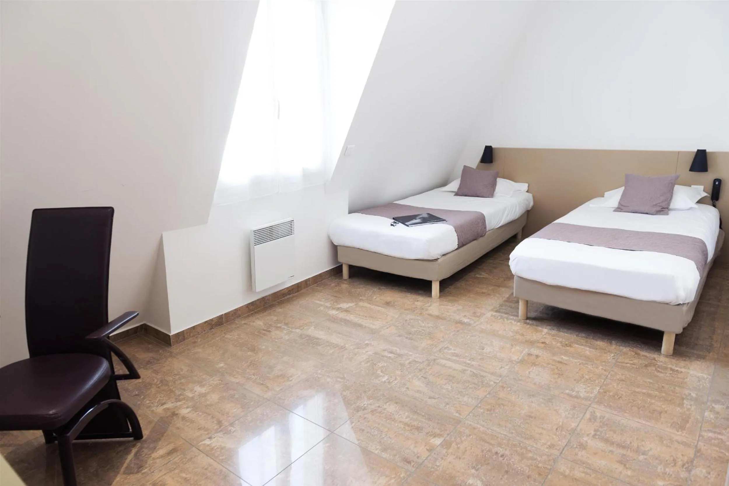 Bedroom in Hôtel Le Saint Germain