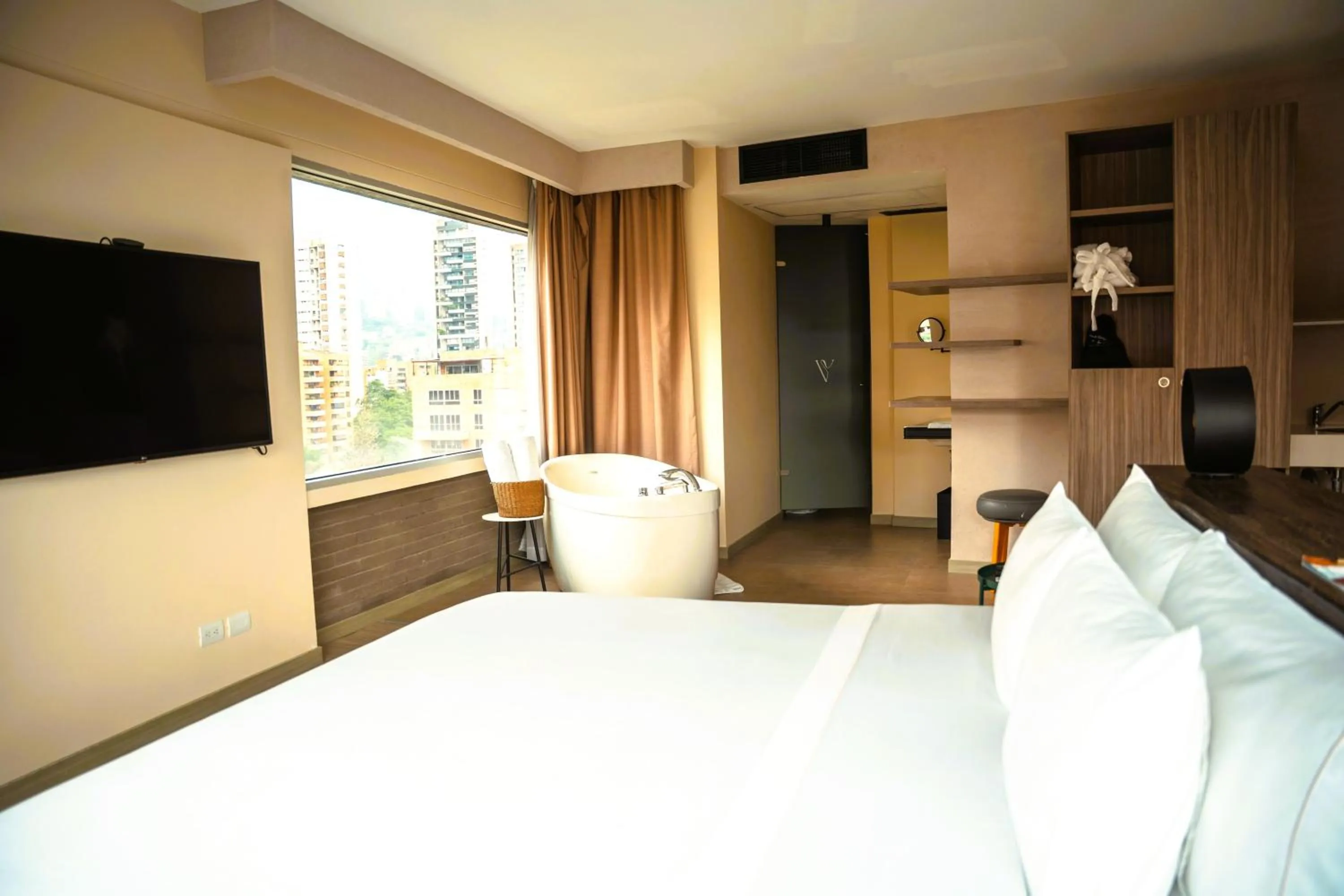 Toilet, Bed in V Grand Hotel, a member of Radisson Individuals