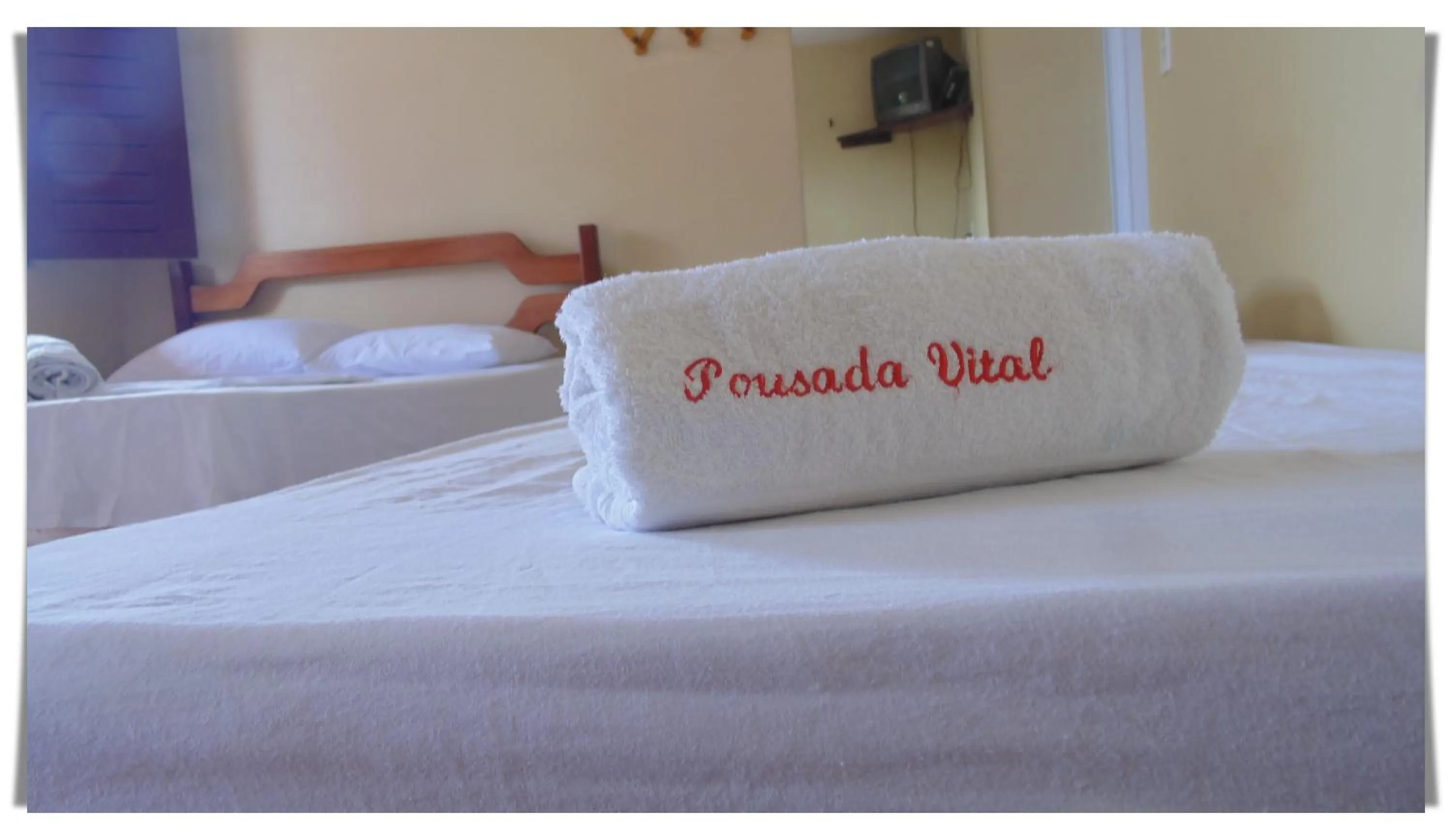 Bed in Pousada Vital