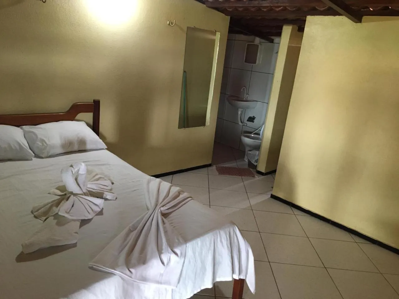 Bed in Pousada Vital