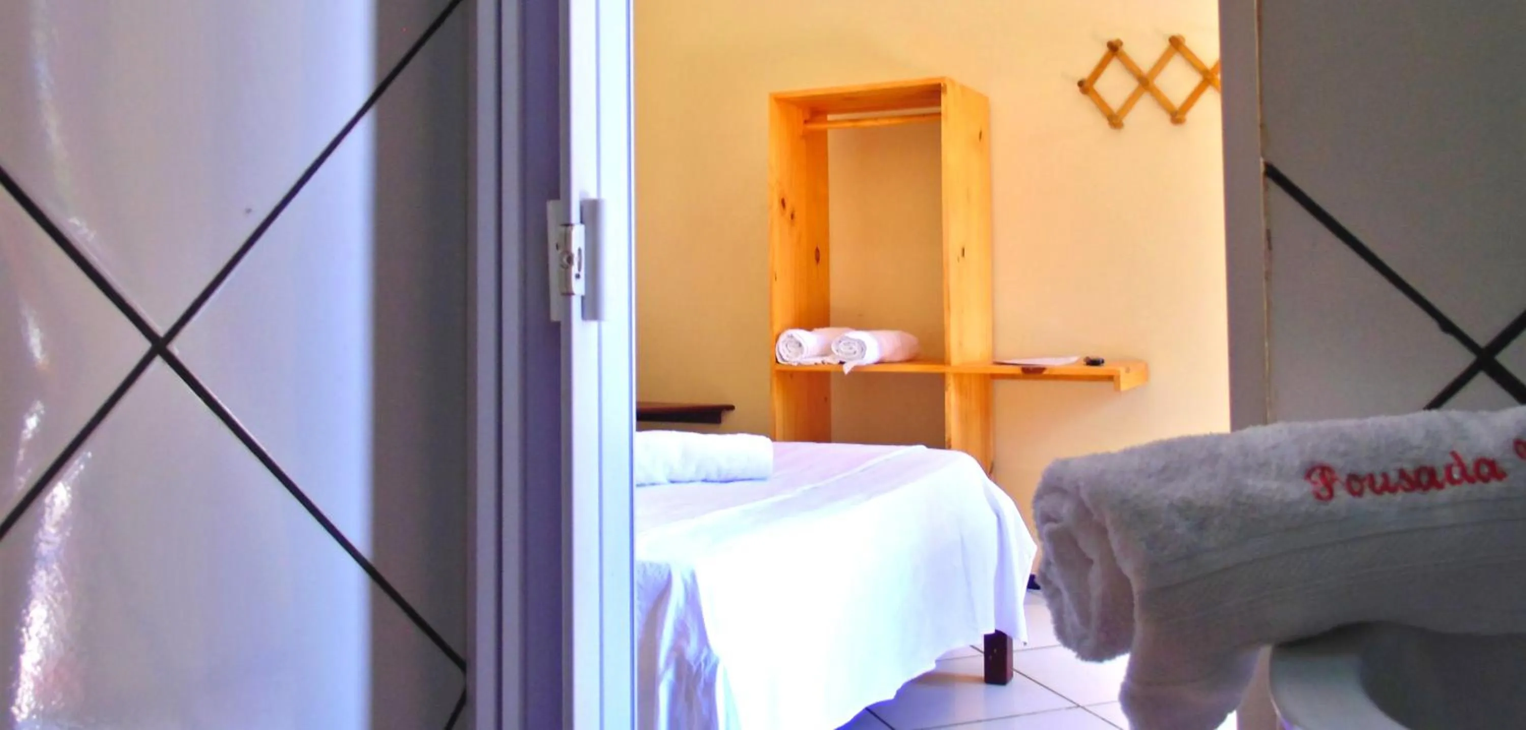 Bed in Pousada Vital