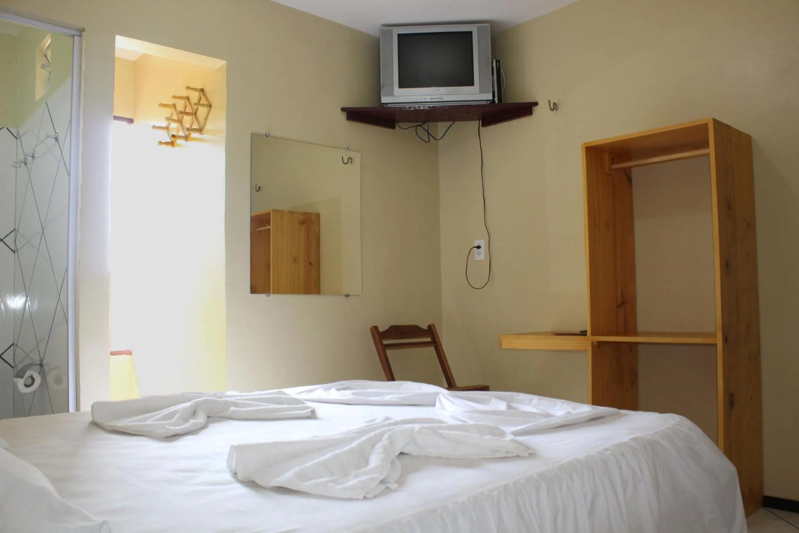 Bed in Pousada Vital