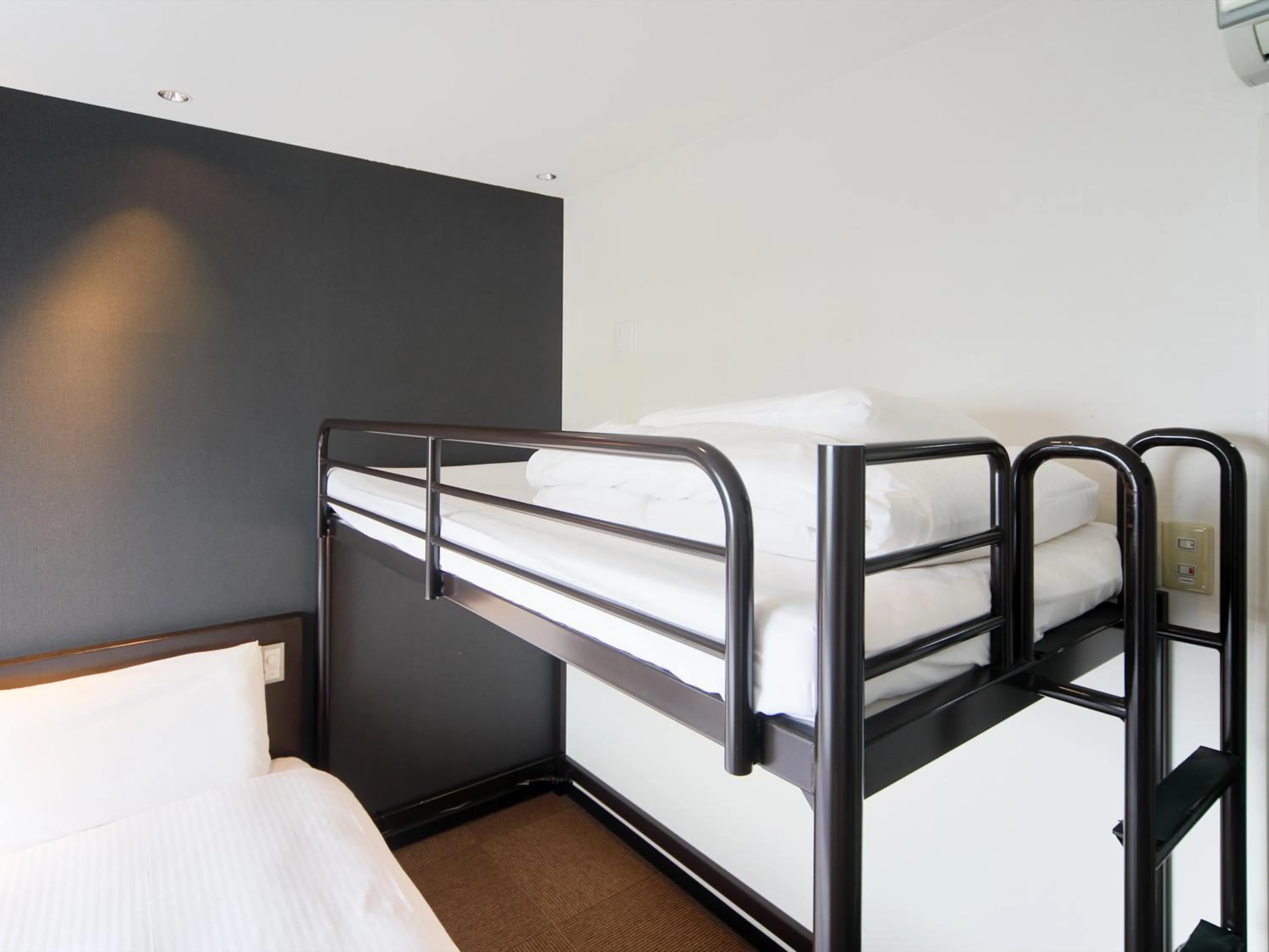 Bed in Comfort Inn Kagoshima Taniyama