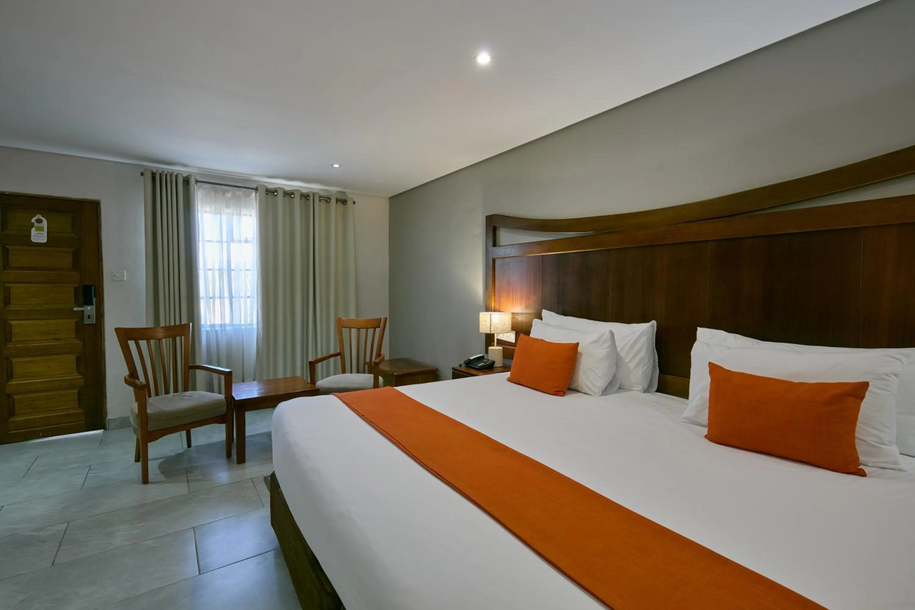 Seating area, Bed in Cresta Jwaneng