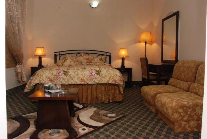 Photo of the whole room, Bed in Savoy Inn Guest House Islamabad