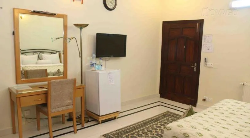 Photo of the whole room, Bed in Savoy Inn Guest House Islamabad