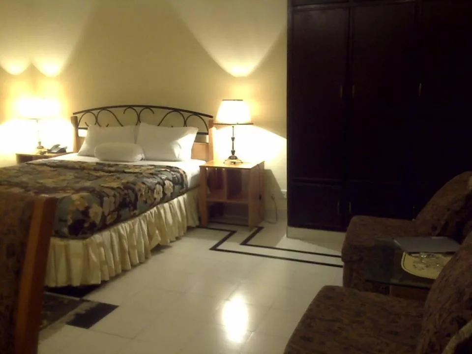 Photo of the whole room, Bed in Savoy Inn Guest House Islamabad