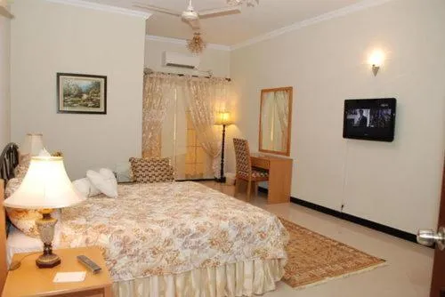 Photo of the whole room, Bed in Savoy Inn Guest House Islamabad