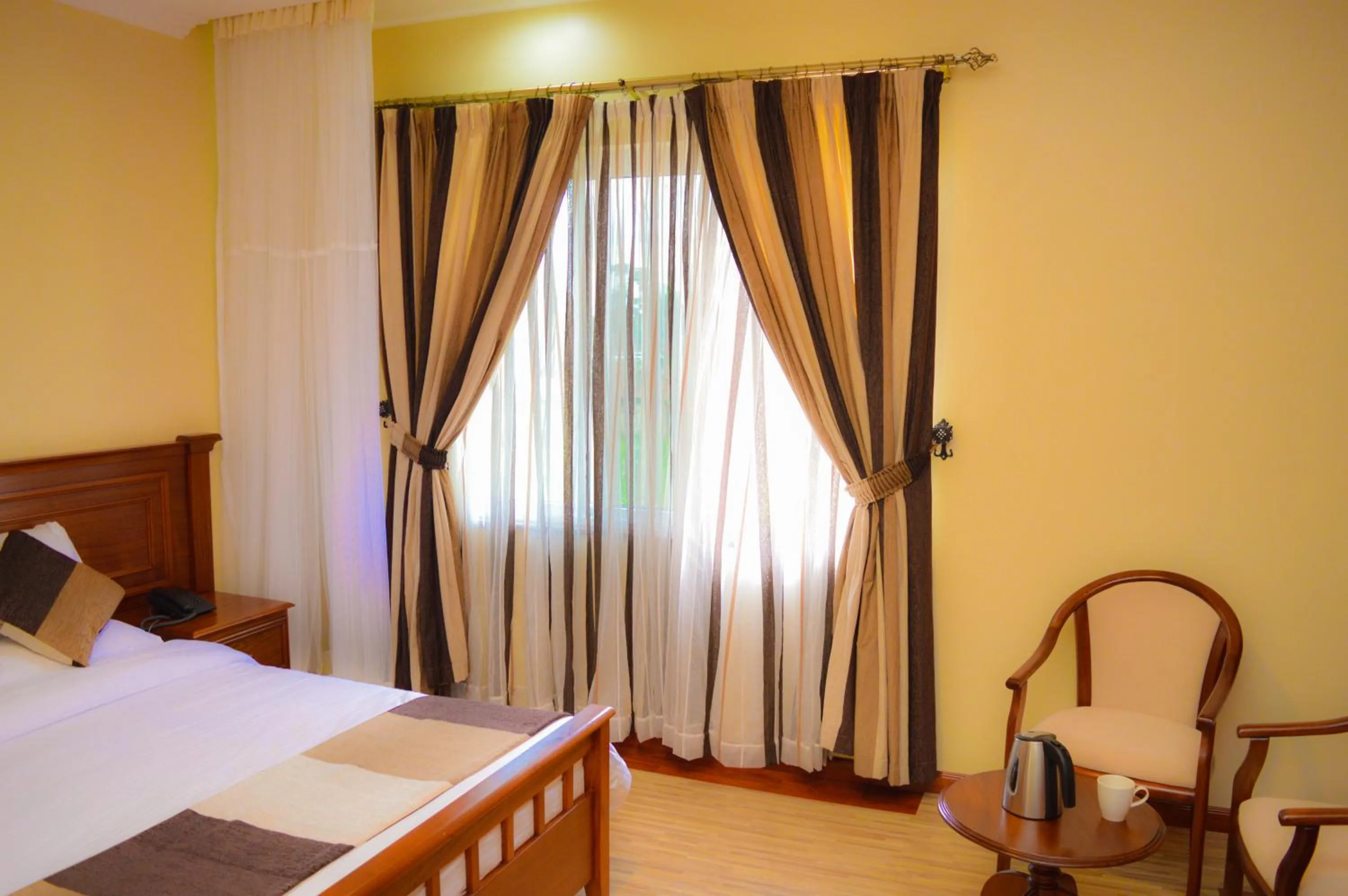 Bedroom, Bed in Red Ruby Hotel