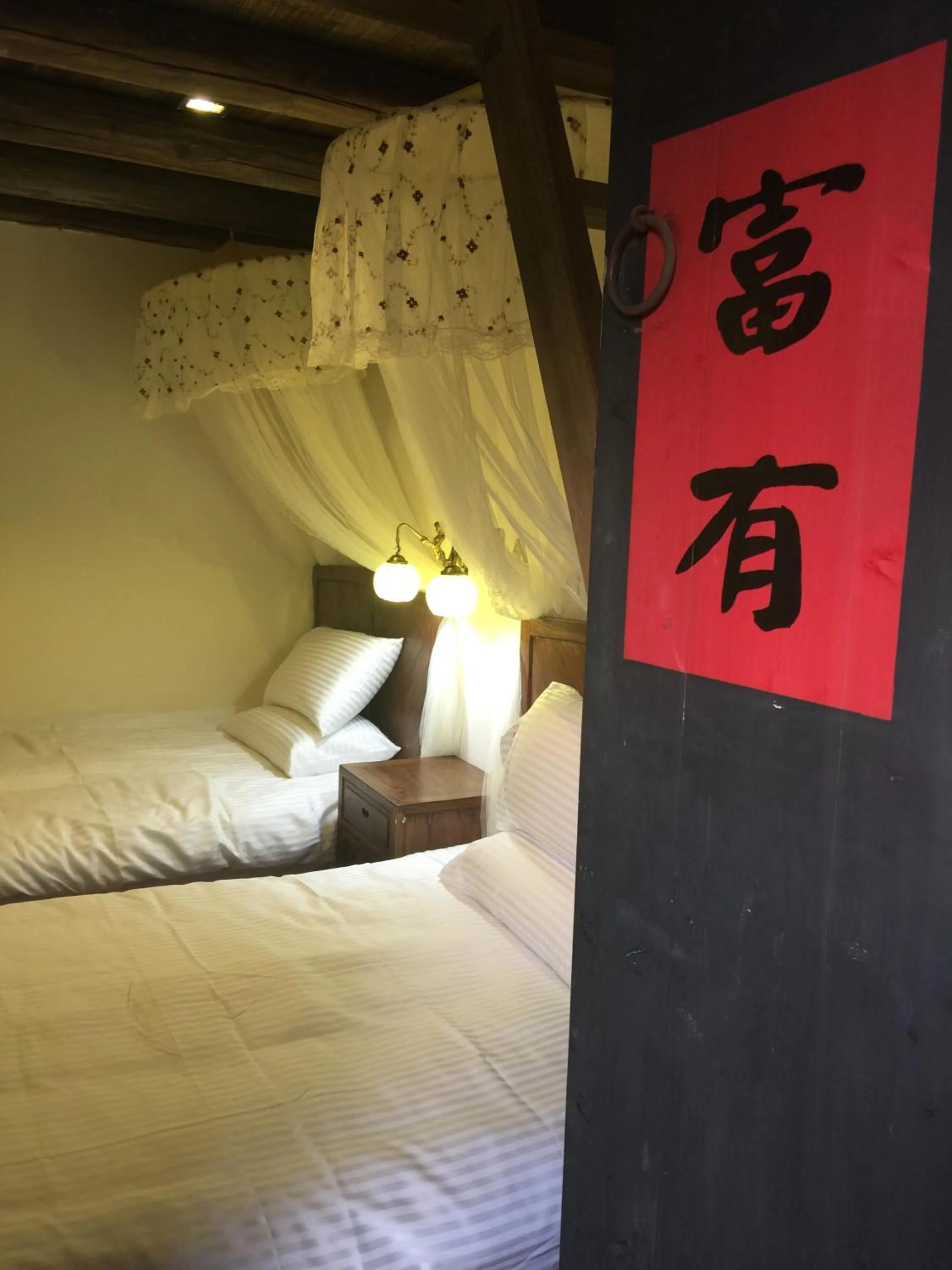 Bed in Red Tomato B&B