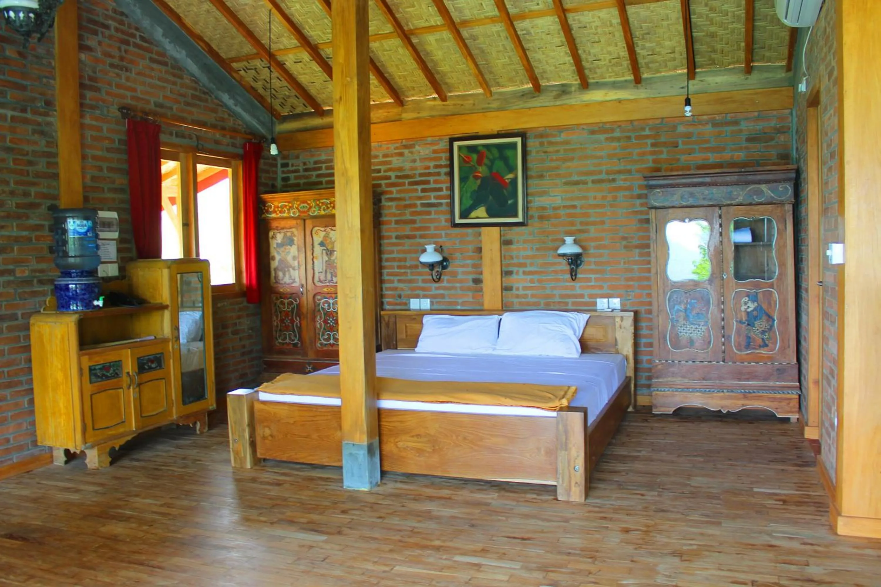 Photo of the whole room, Bed in Desa Limasan Resort
