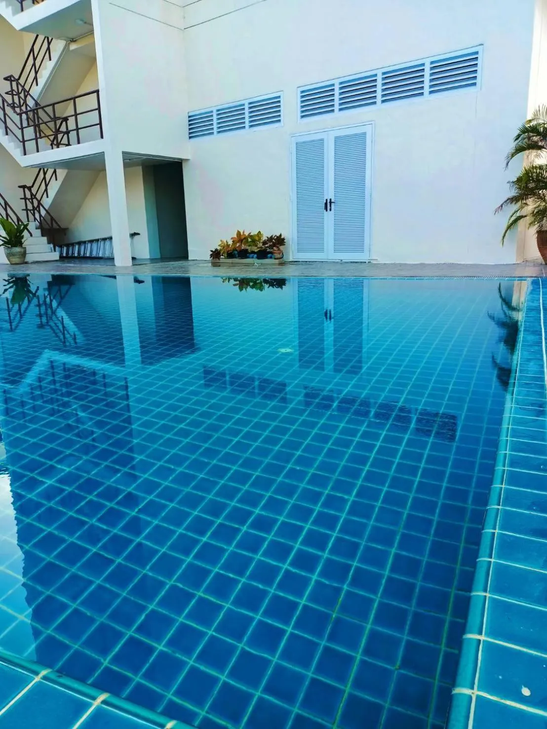 Swimming pool in Mayflower Grande Hotel Phitsanulok