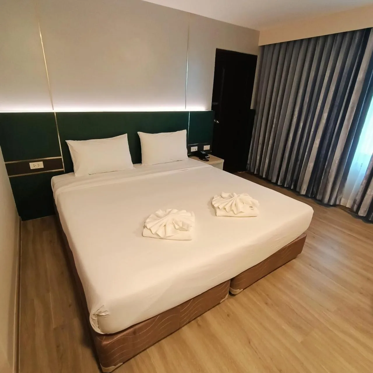 Bed in Mayflower Grande Hotel Phitsanulok