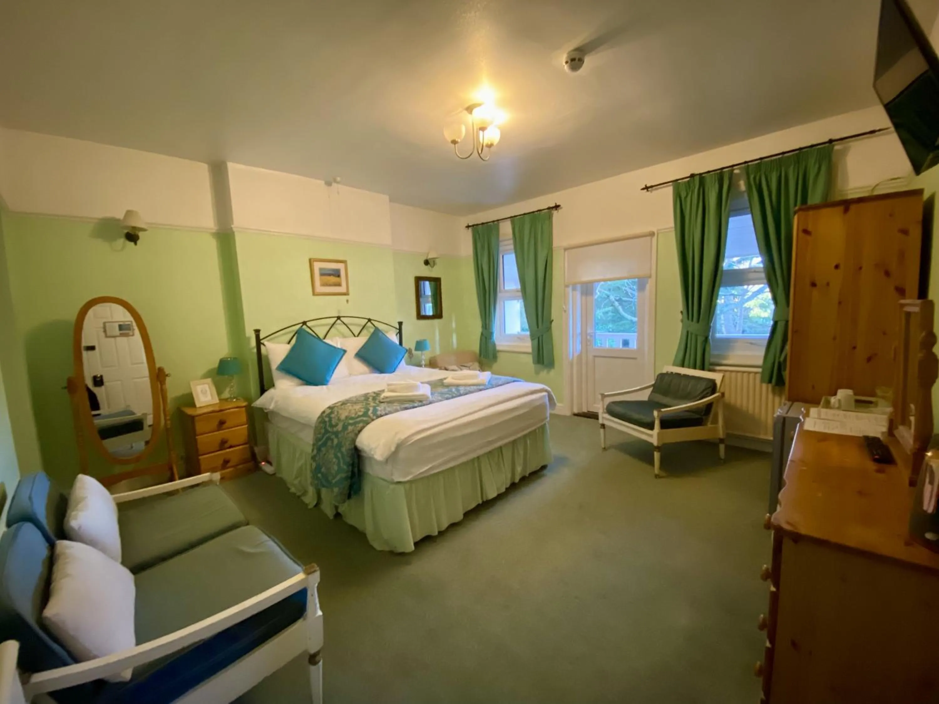 Bed in Pickwicks Guest House