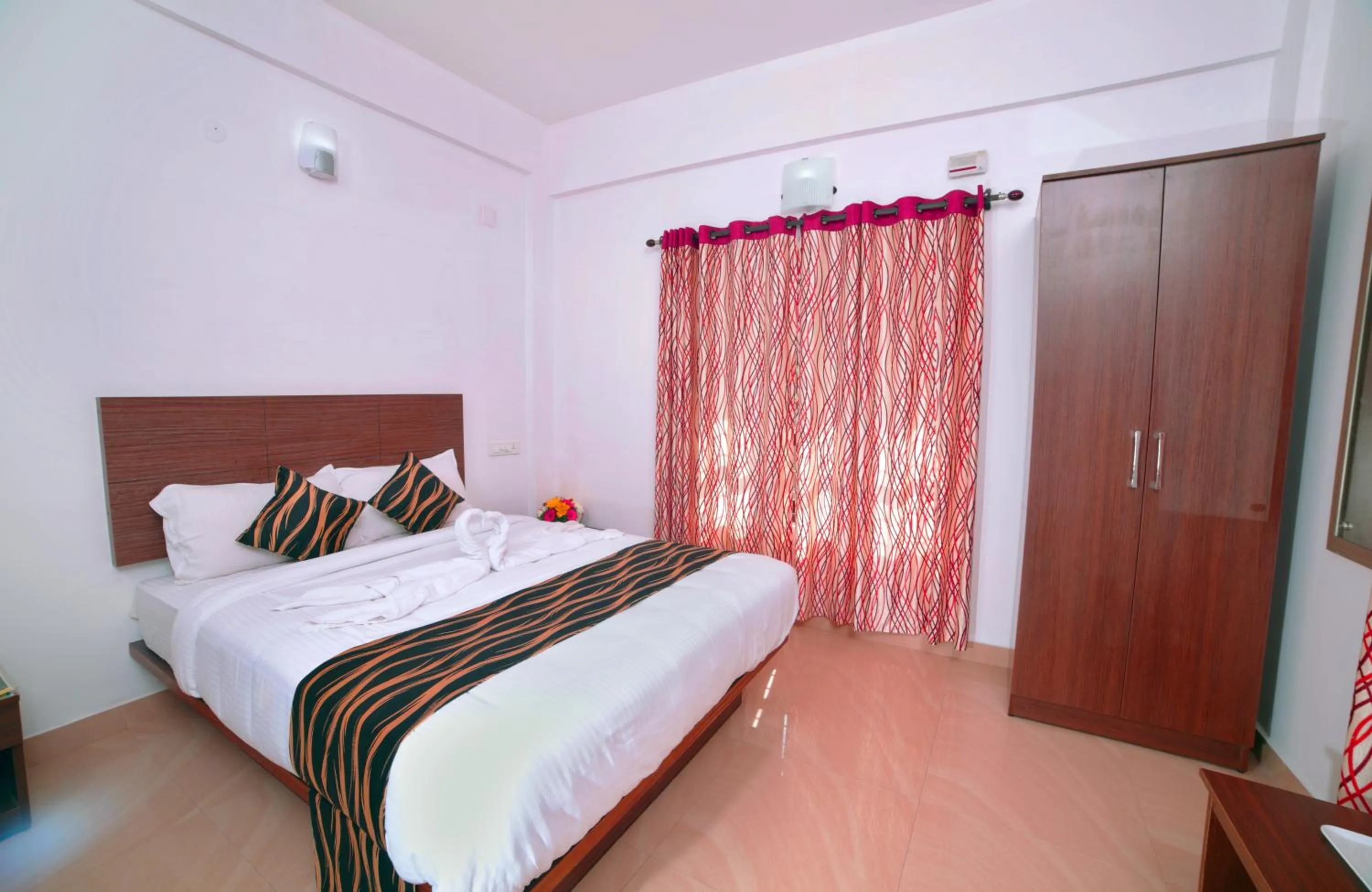 Bed in Pine Tree Munnar