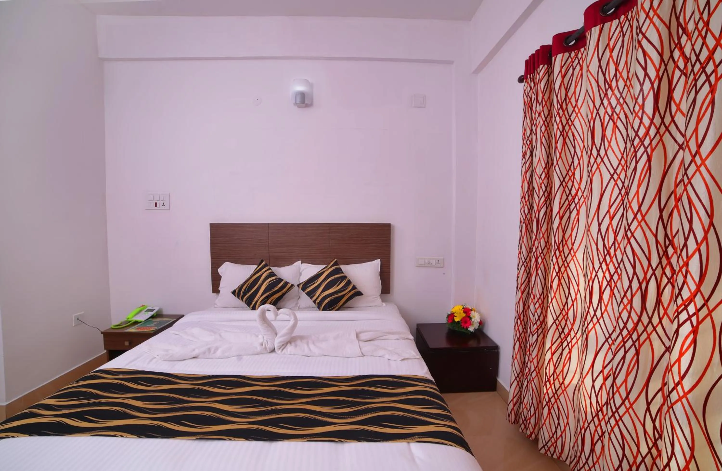 Bed in Pine Tree Munnar