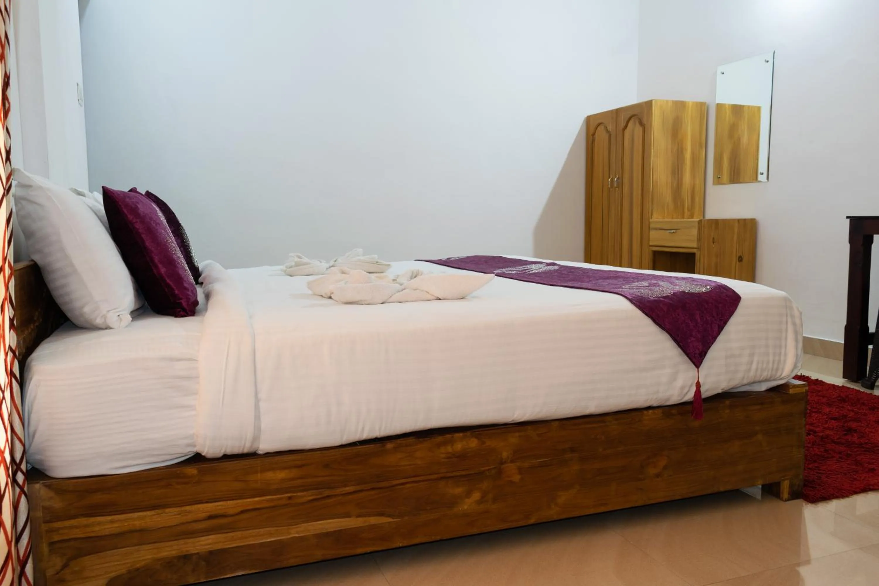 Bed in Pine Tree Munnar