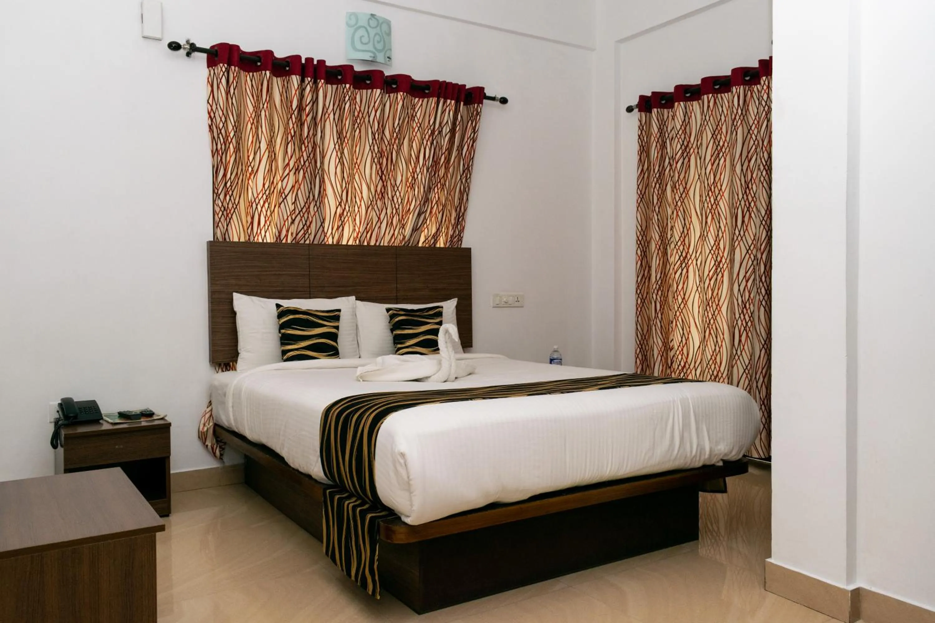 Bed in Pine Tree Munnar