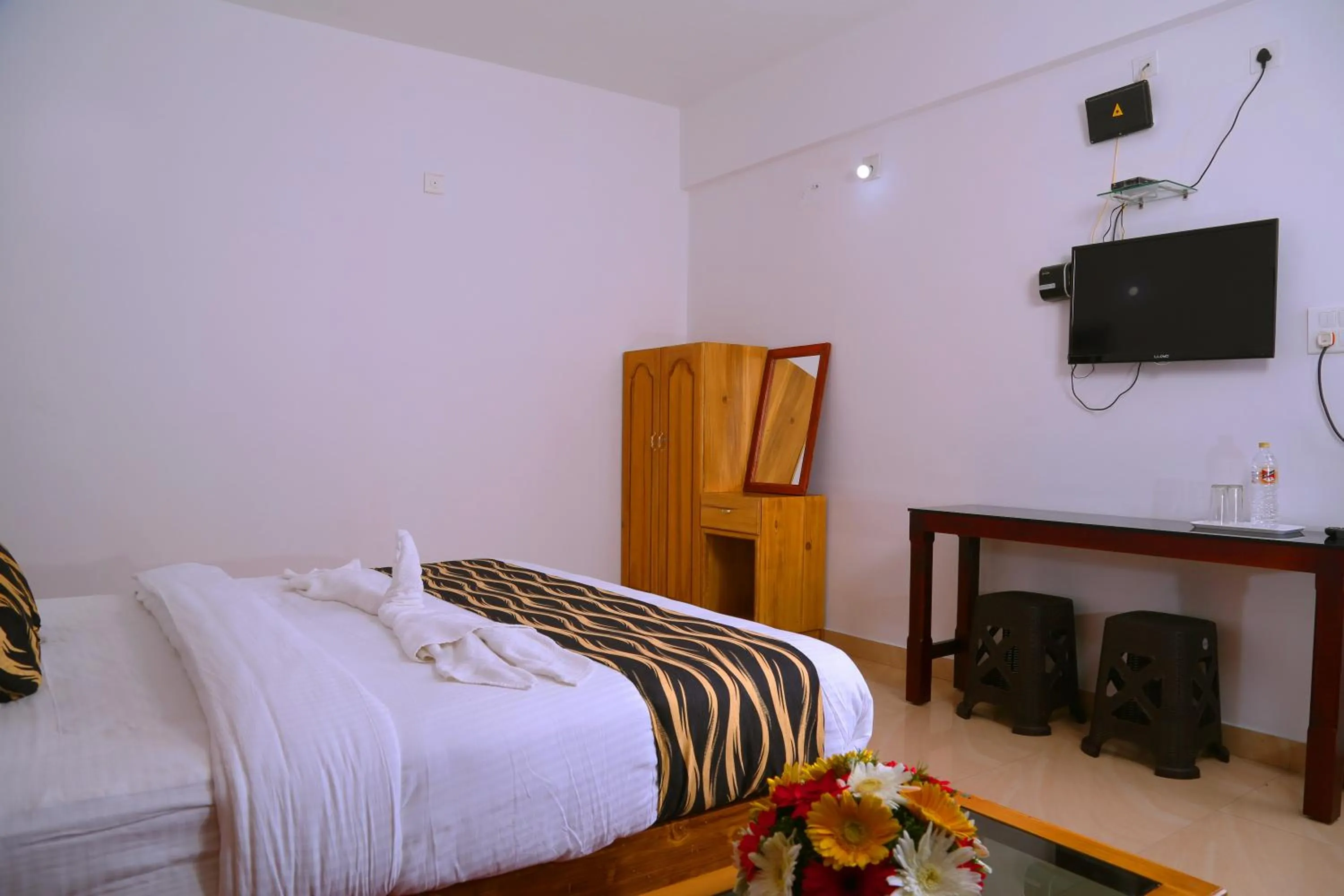 Bed in Pine Tree Munnar