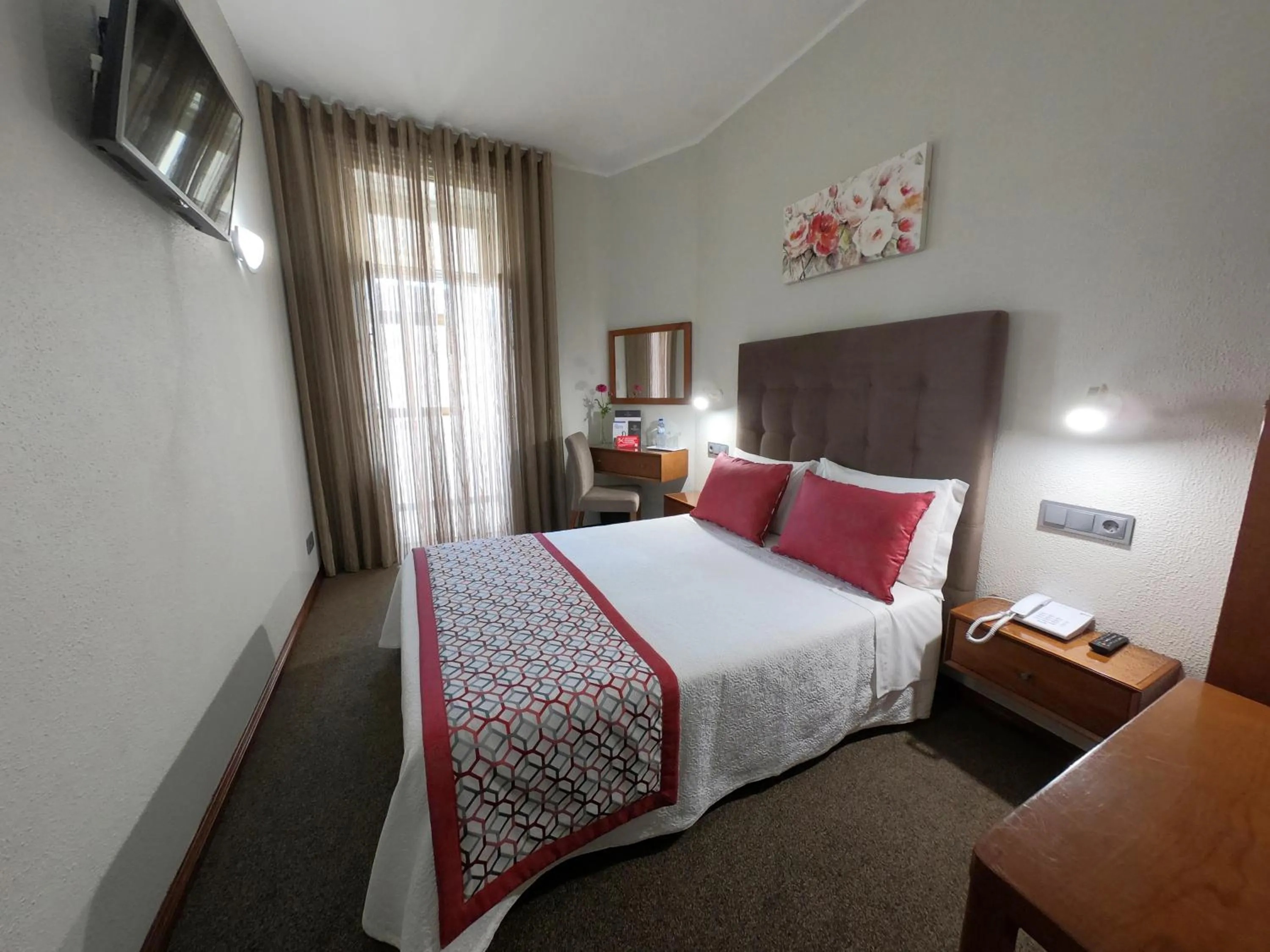 Bed in Lusitana Hotel