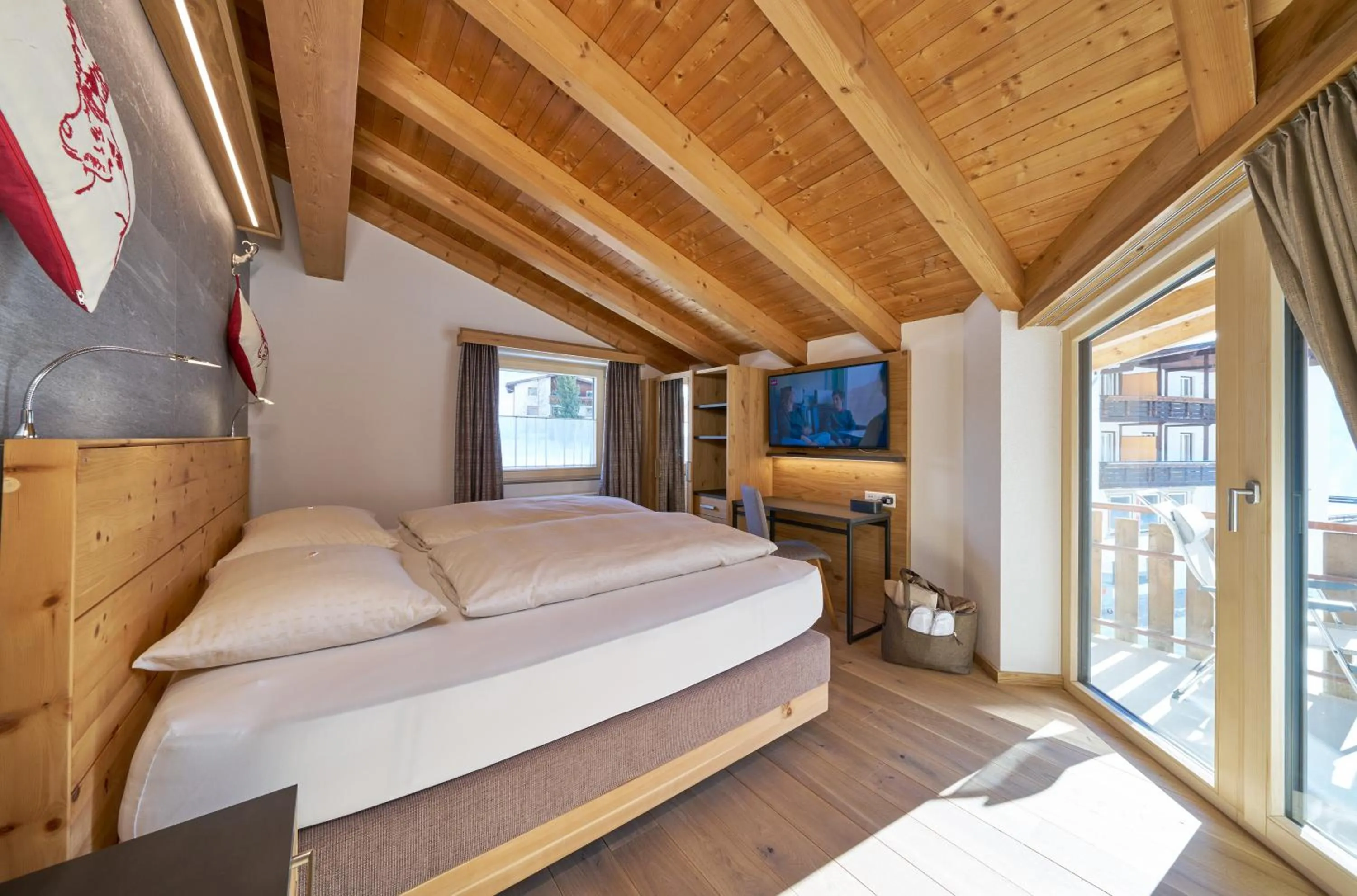 Bed in Aparthotel Grischuna