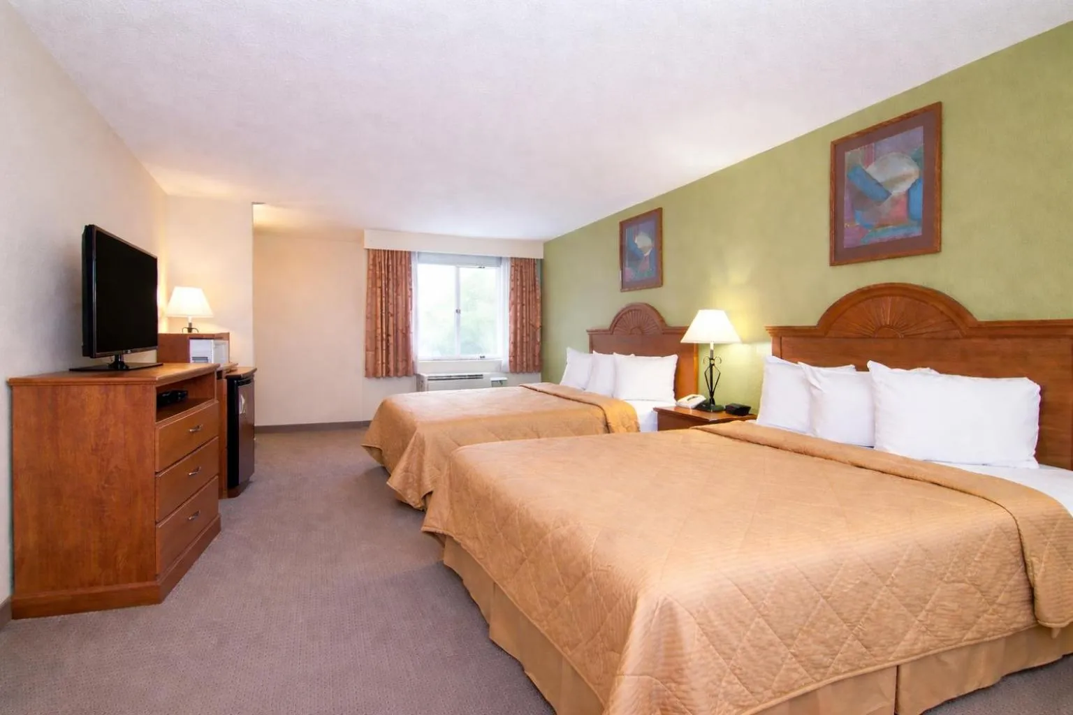 Photo of the whole room, Bed in Knights Inn Gallup at 3208 W Hwy 66