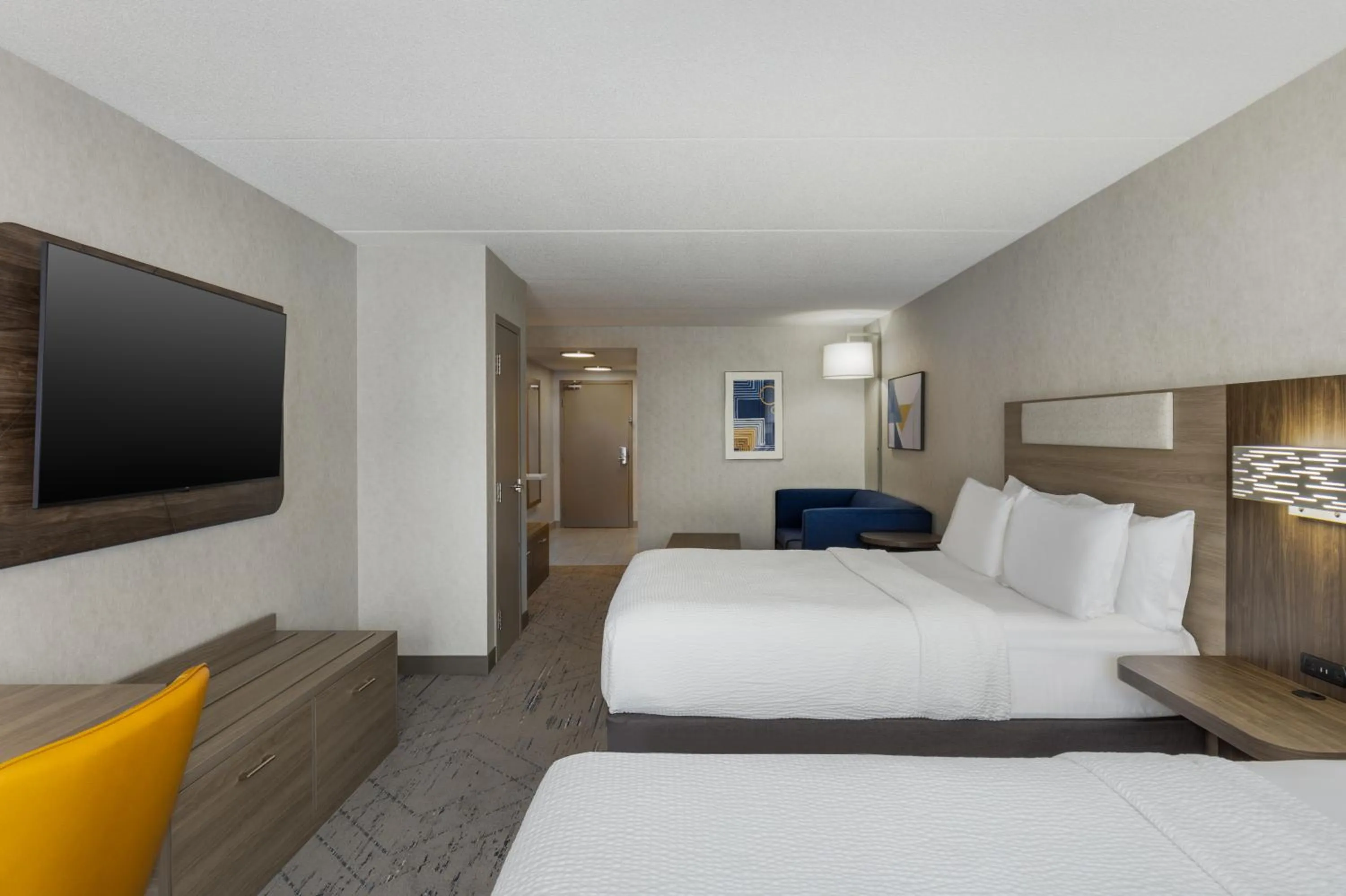 Communal lounge/ TV room, Bed in Holiday Inn Express & Suites Ottawa East-Orleans by IHG