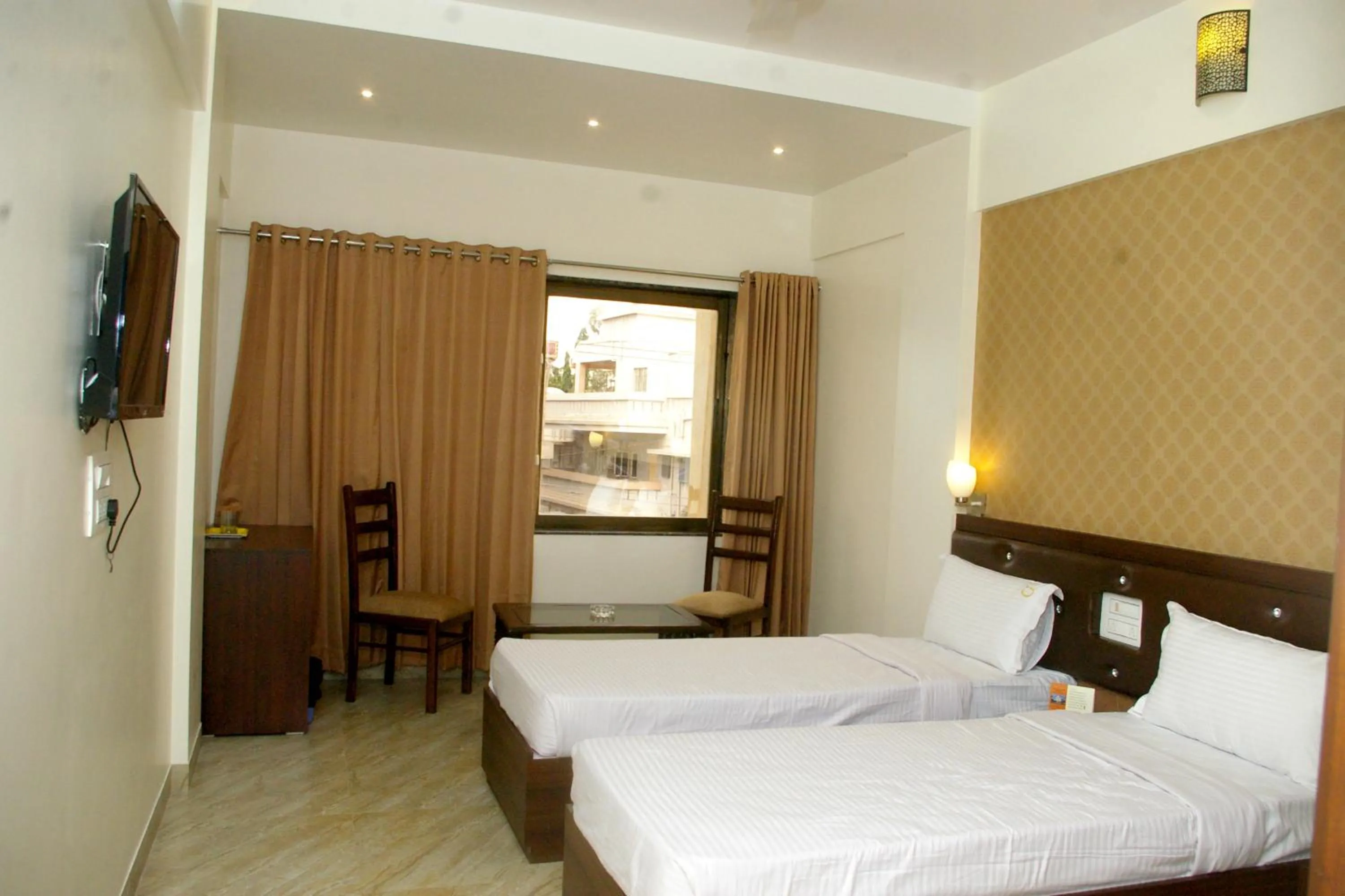 Photo of the whole room, Bed in Hotel Gulmohar Pride