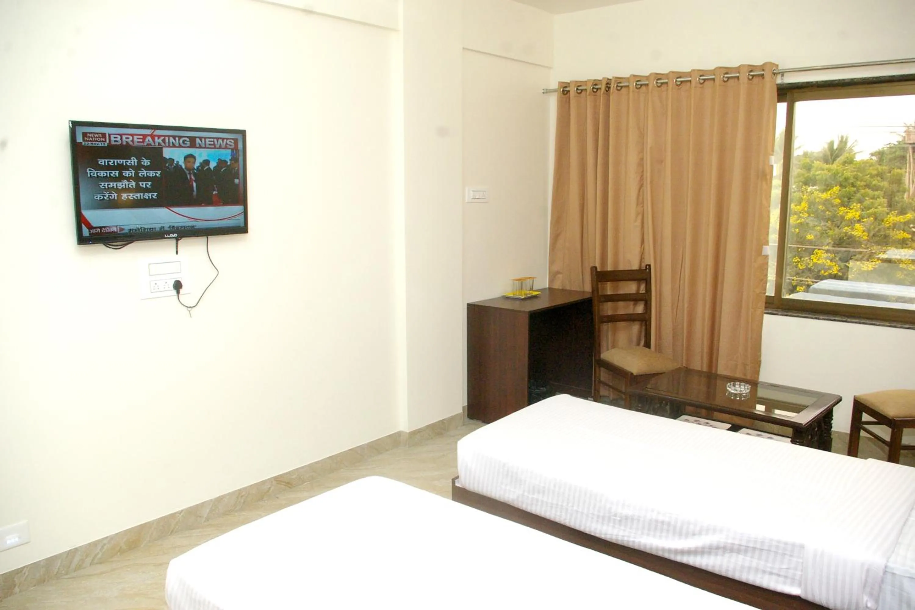 Bed in Hotel Gulmohar Pride