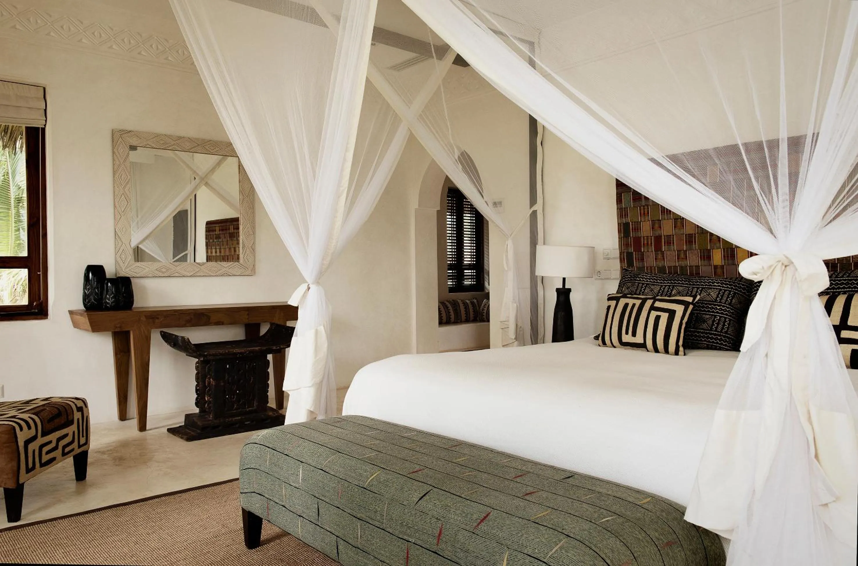 Bed in Qambani Luxury Resort