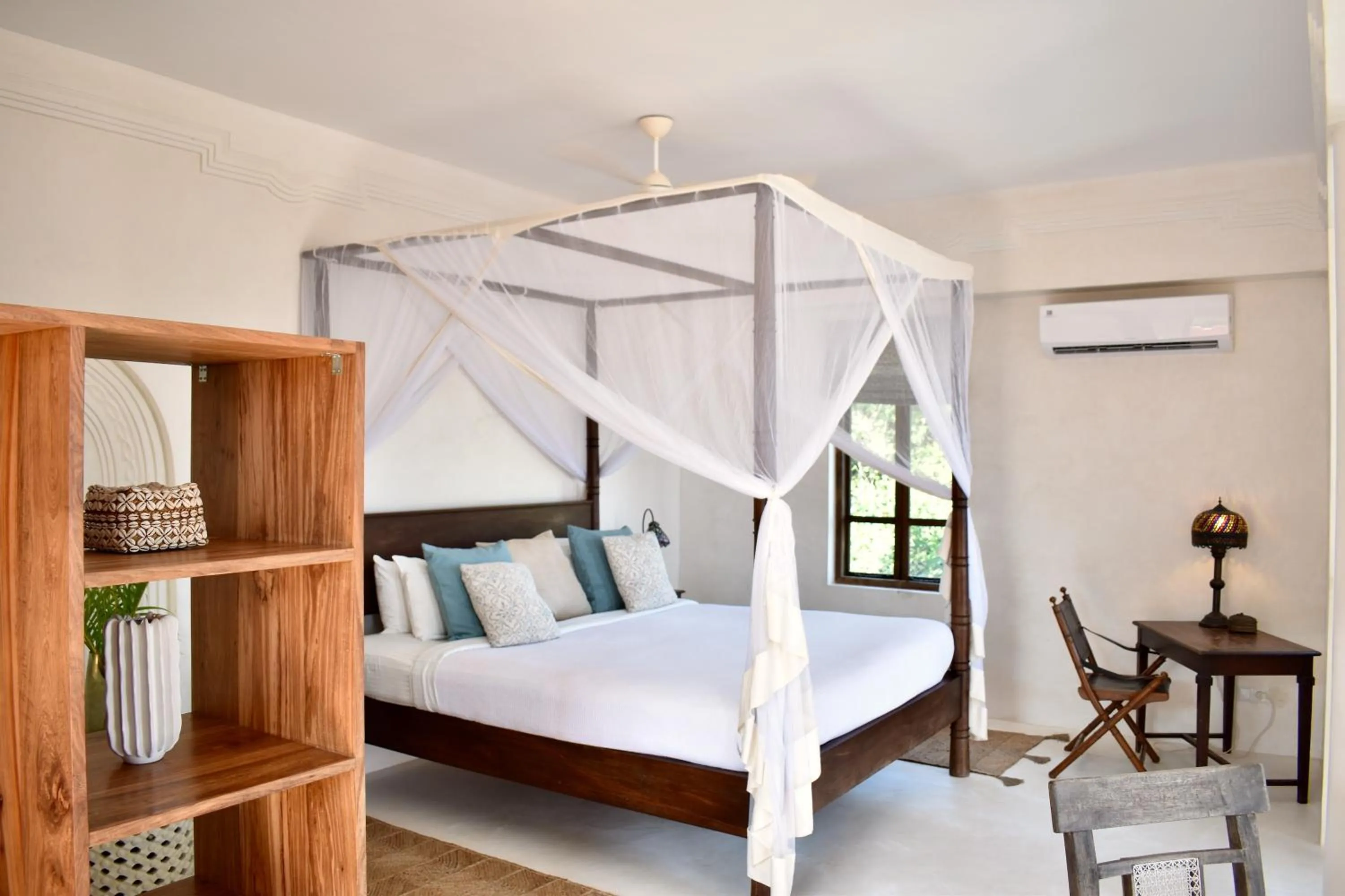 Bed in Qambani Luxury Resort