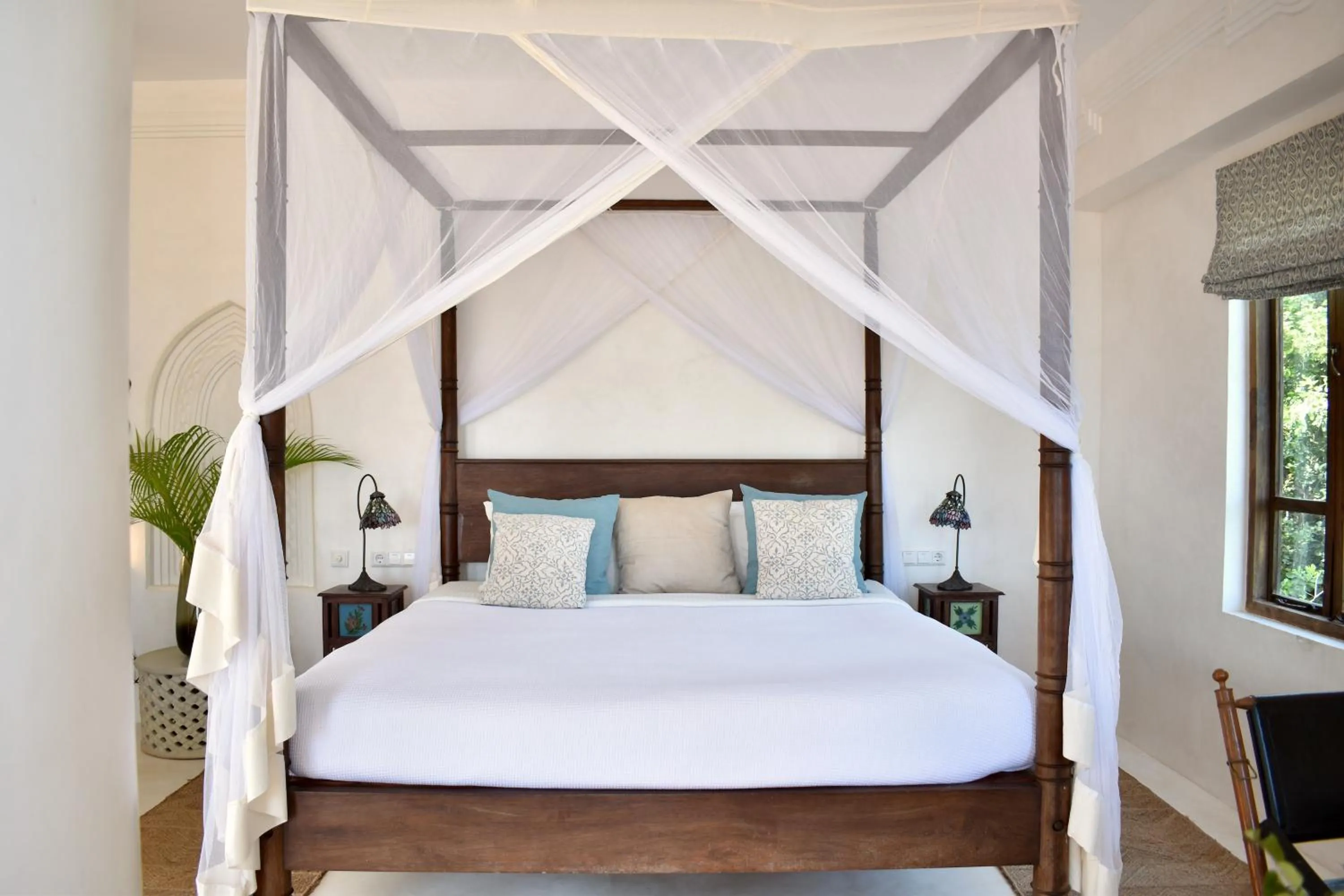 Bed in Qambani Luxury Resort