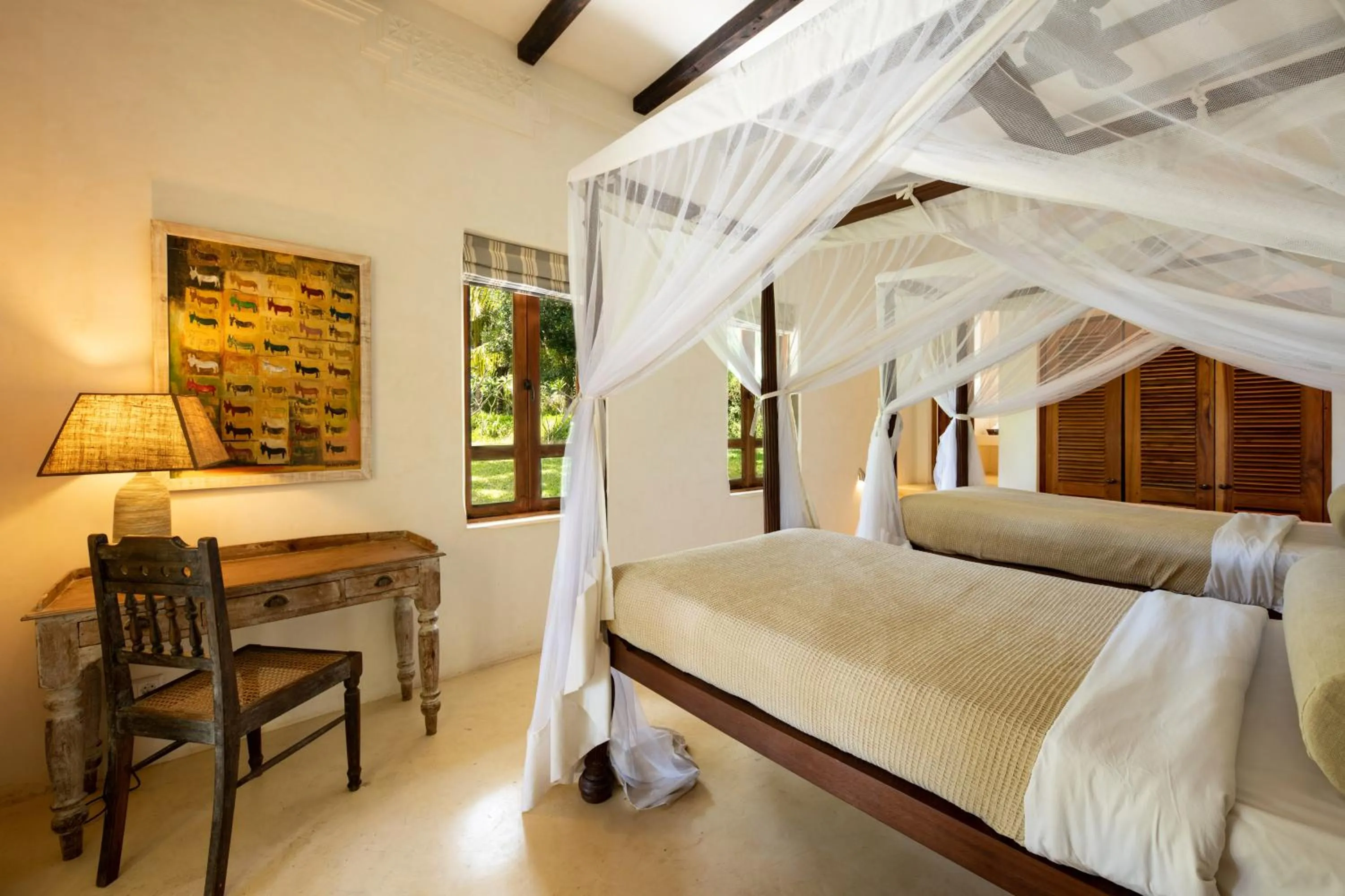 Bed in Qambani Luxury Resort