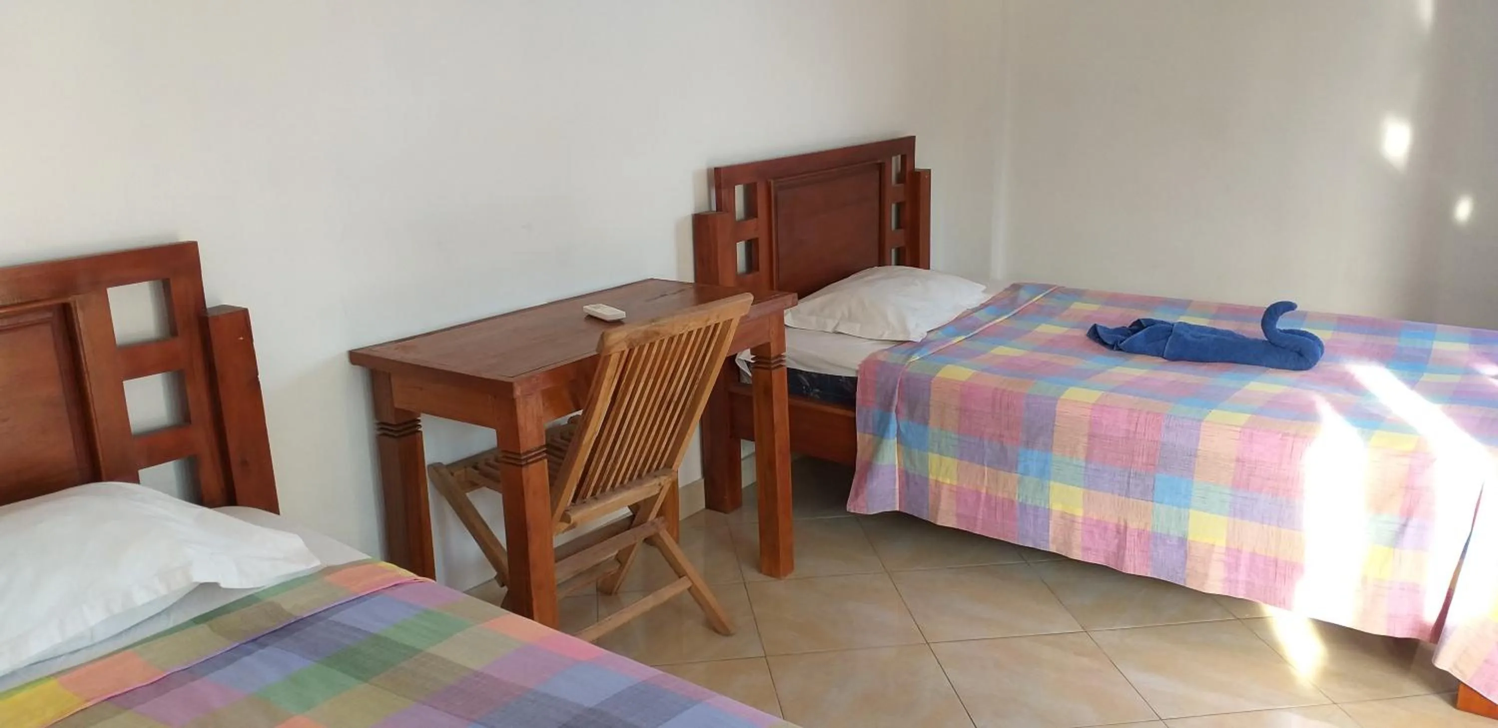 Bed in Amed Sari Beach Guesthouse