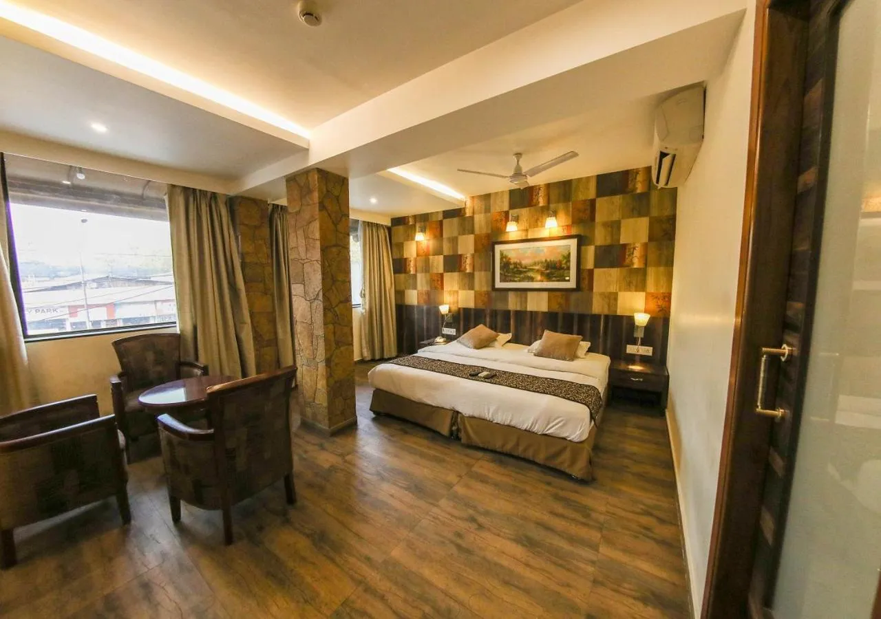 Photo of the whole room, Bed in Hotel Maharana Inn Chembur