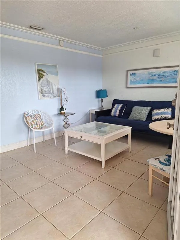 Living room, Bed in Blind Pass Resort Motel