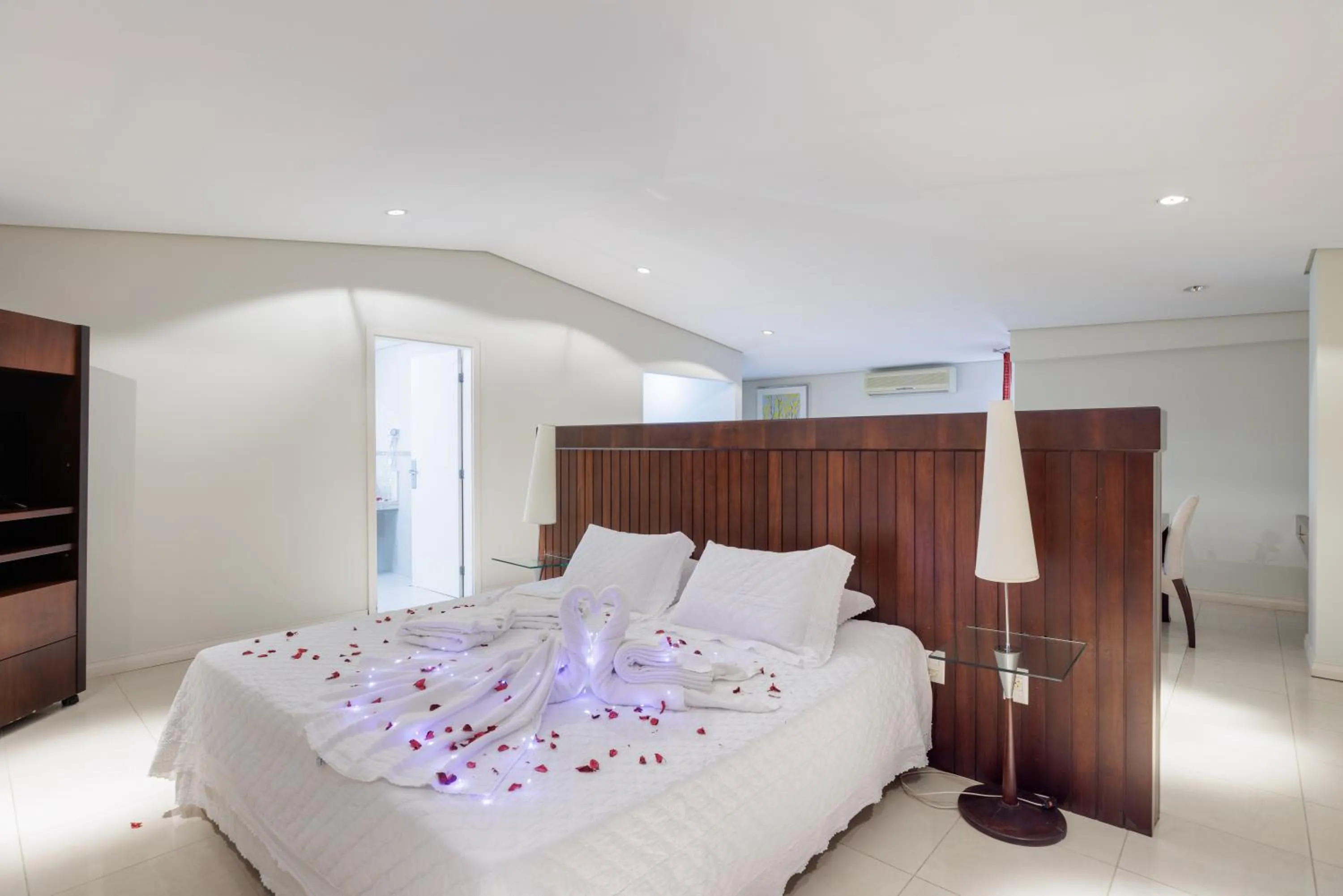 Bed in Le Village Flats e Hotel