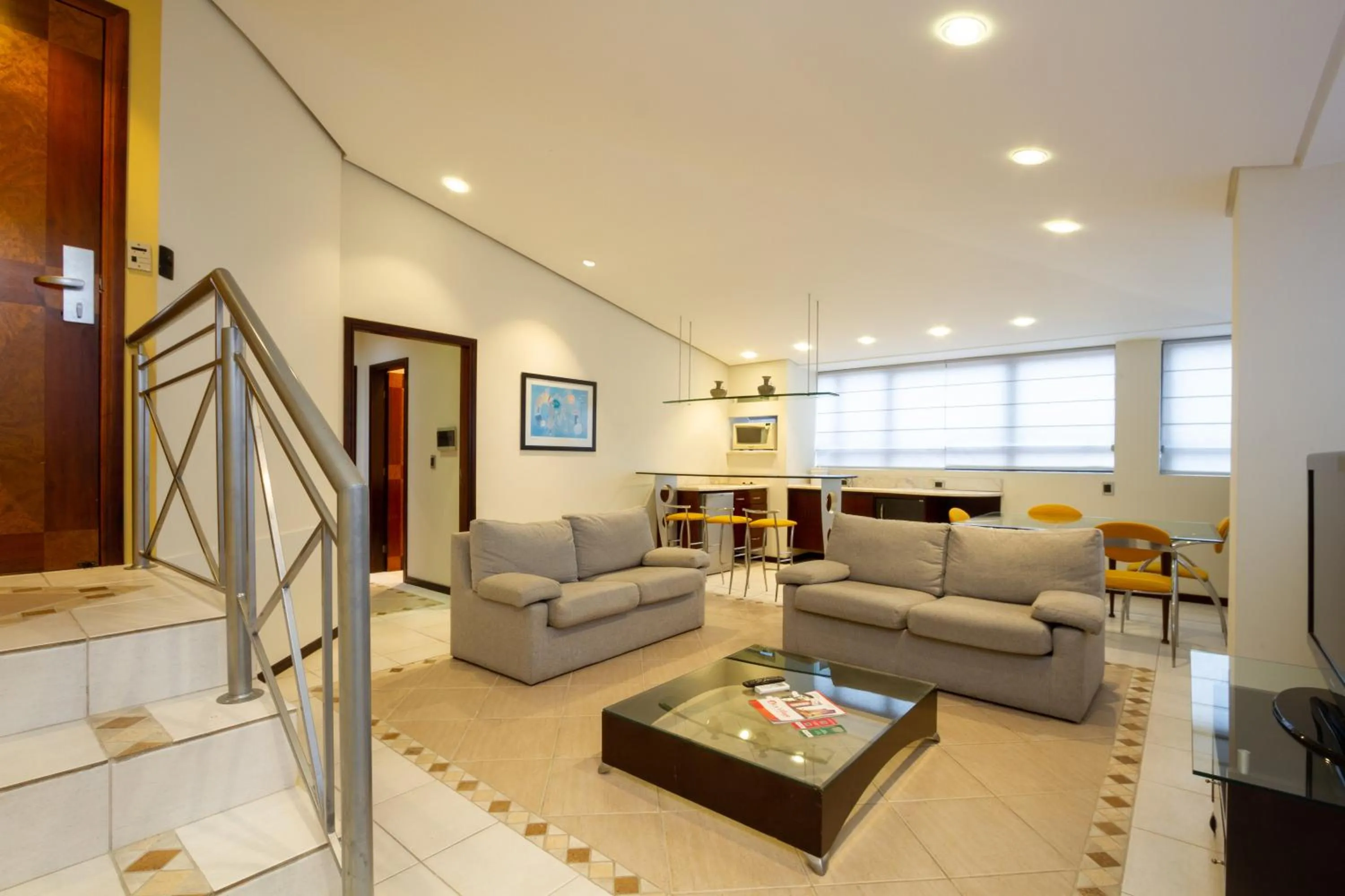 Le Village Flats e Hotel