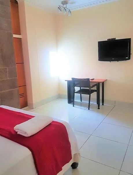 Bed in Hotel Apart Guayaquil Aeropuerto