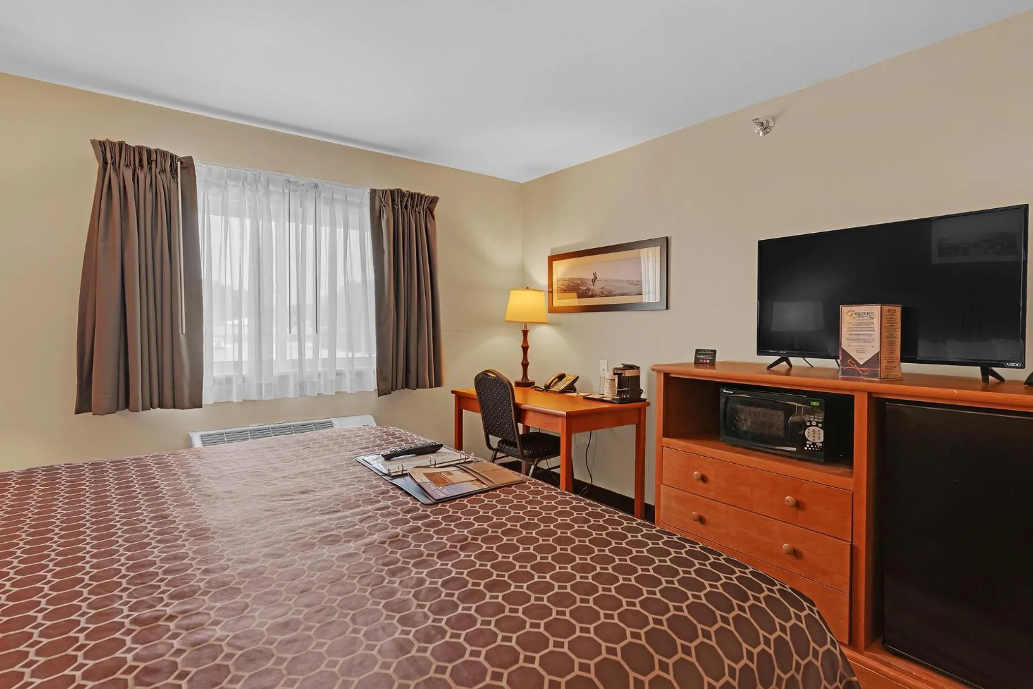 Bed in Bowman Lodge & Convention Center